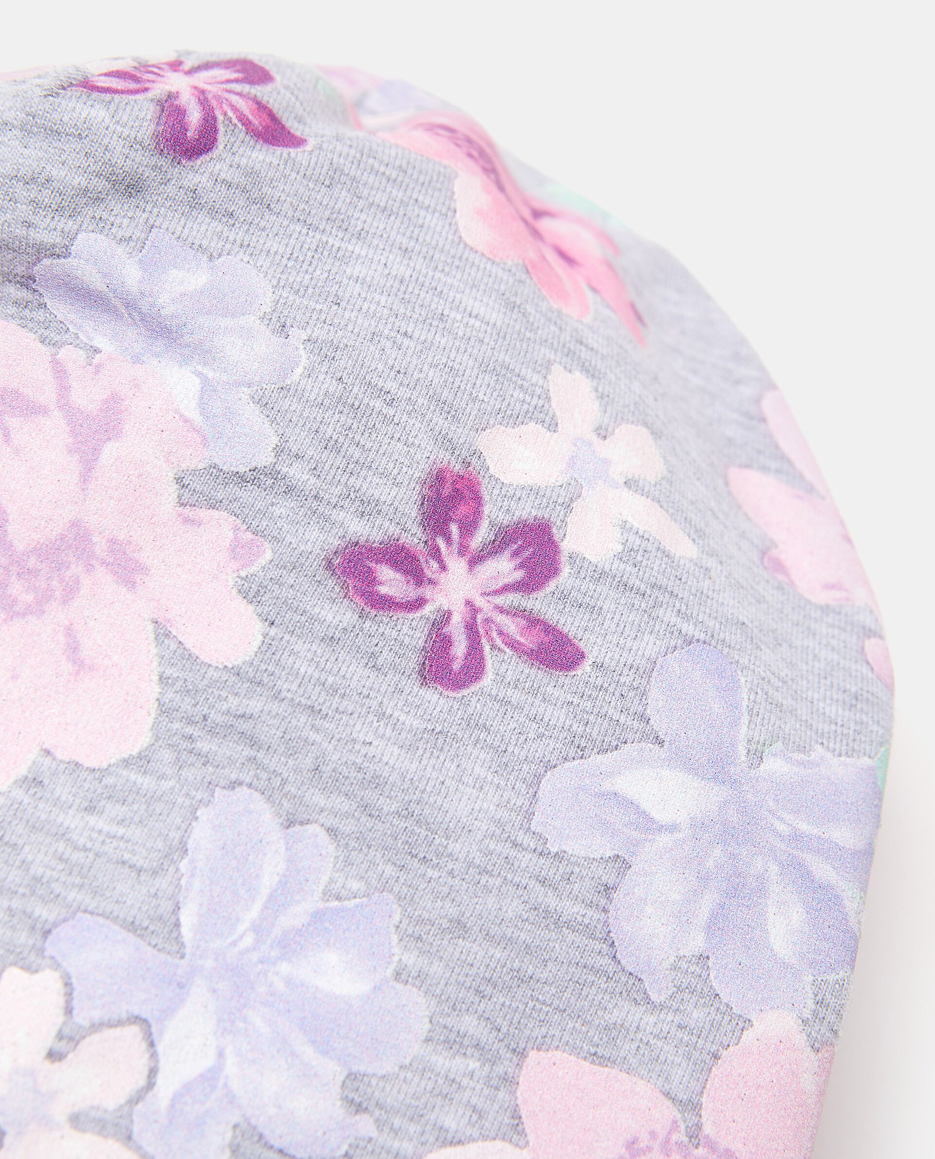 Berrettino in cotone elasticato con fantasia floreale neonata