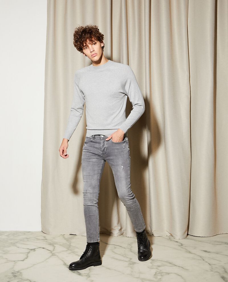 Jeans modello skinny effetto ruined uomo cover