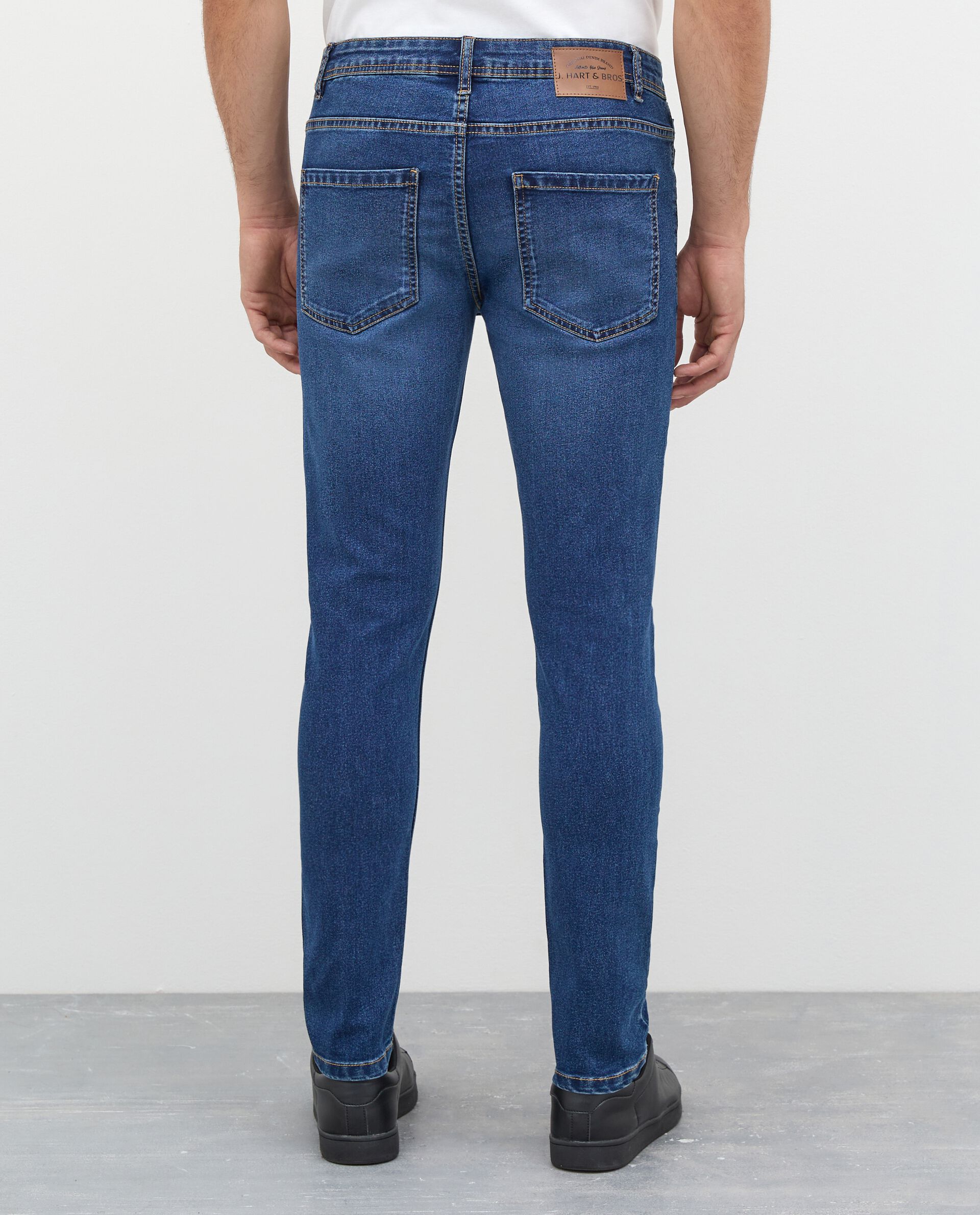 Jeans 5 tasche con apertura bottoni uomo