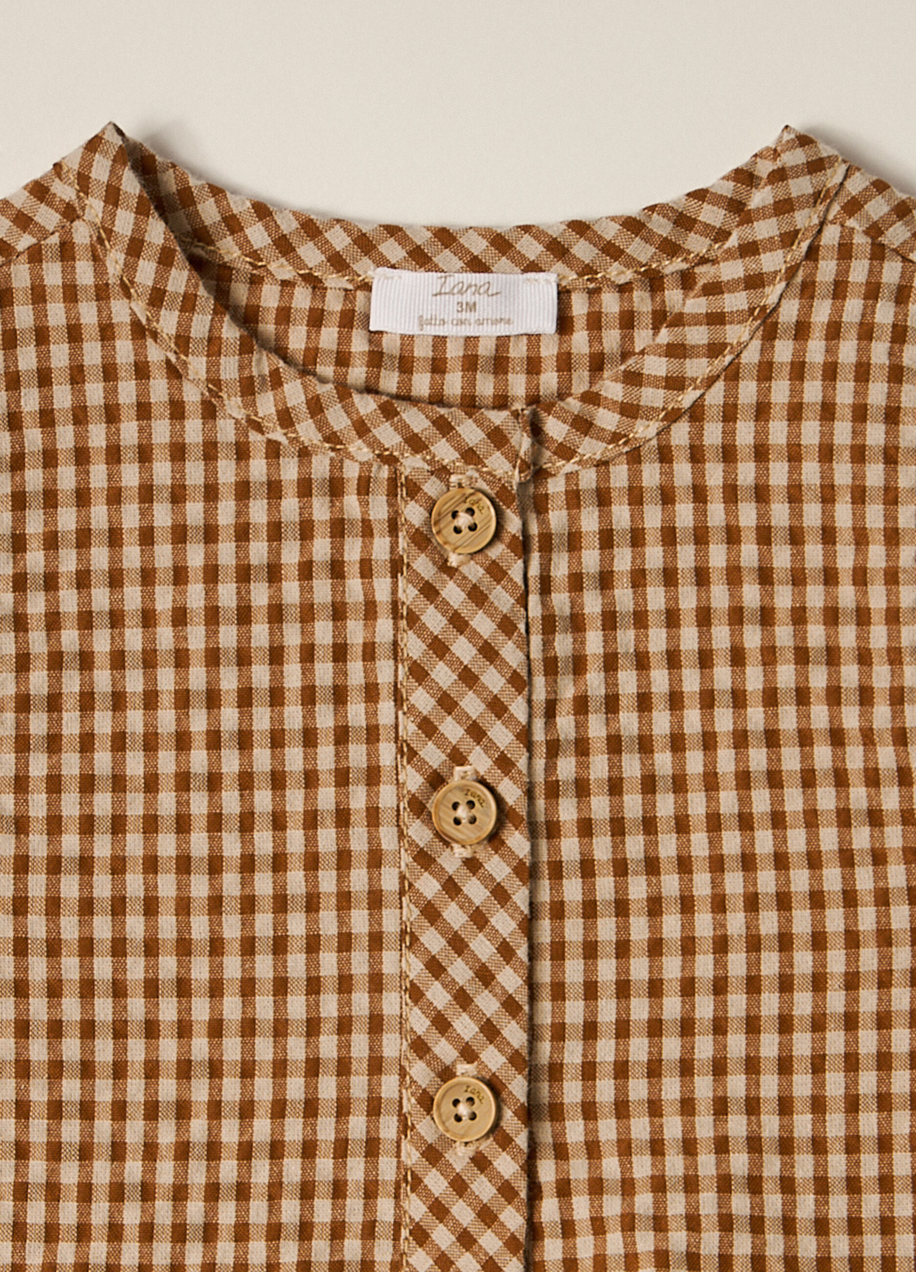 Set cappello e pagliaccetto a quadri neonato_2