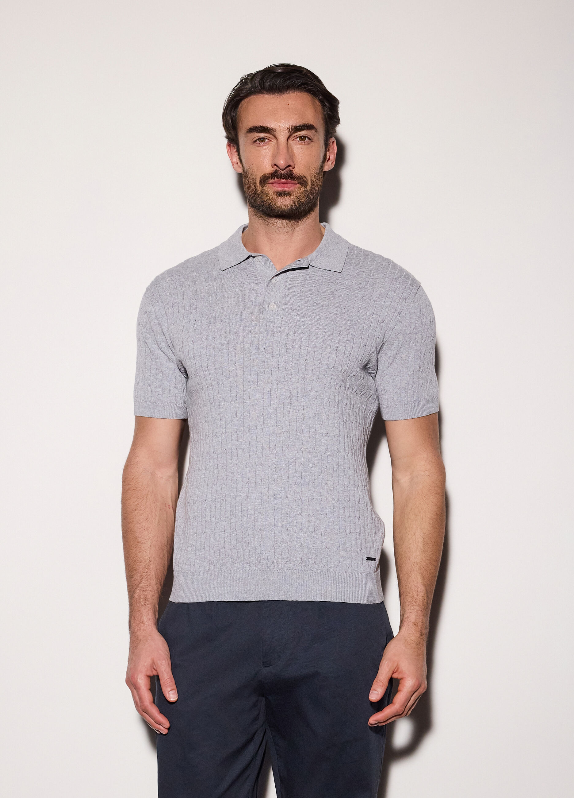 Polo a maniche corte in maglia a treccia uomo_0