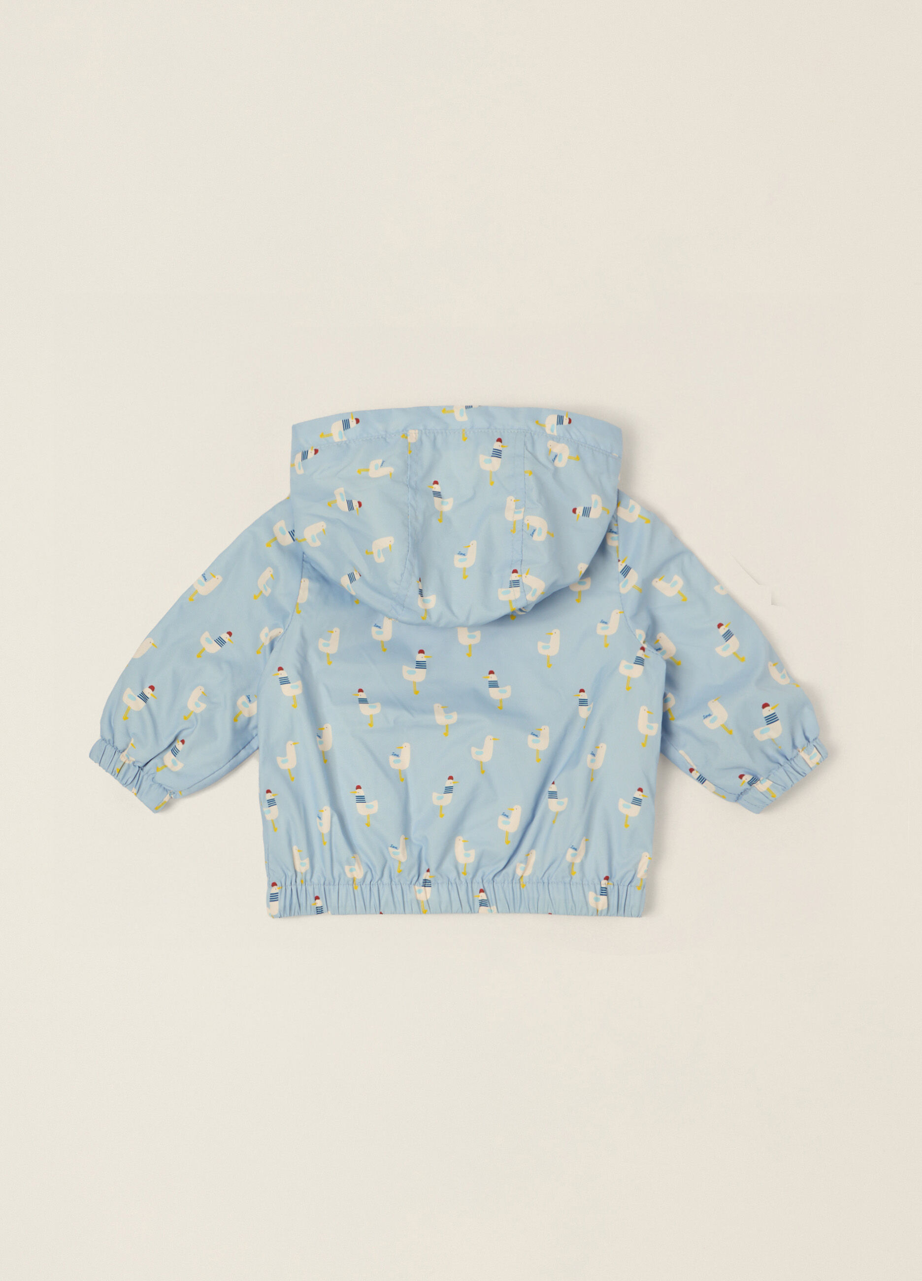 Giacca azzurra con zip per neonato_1