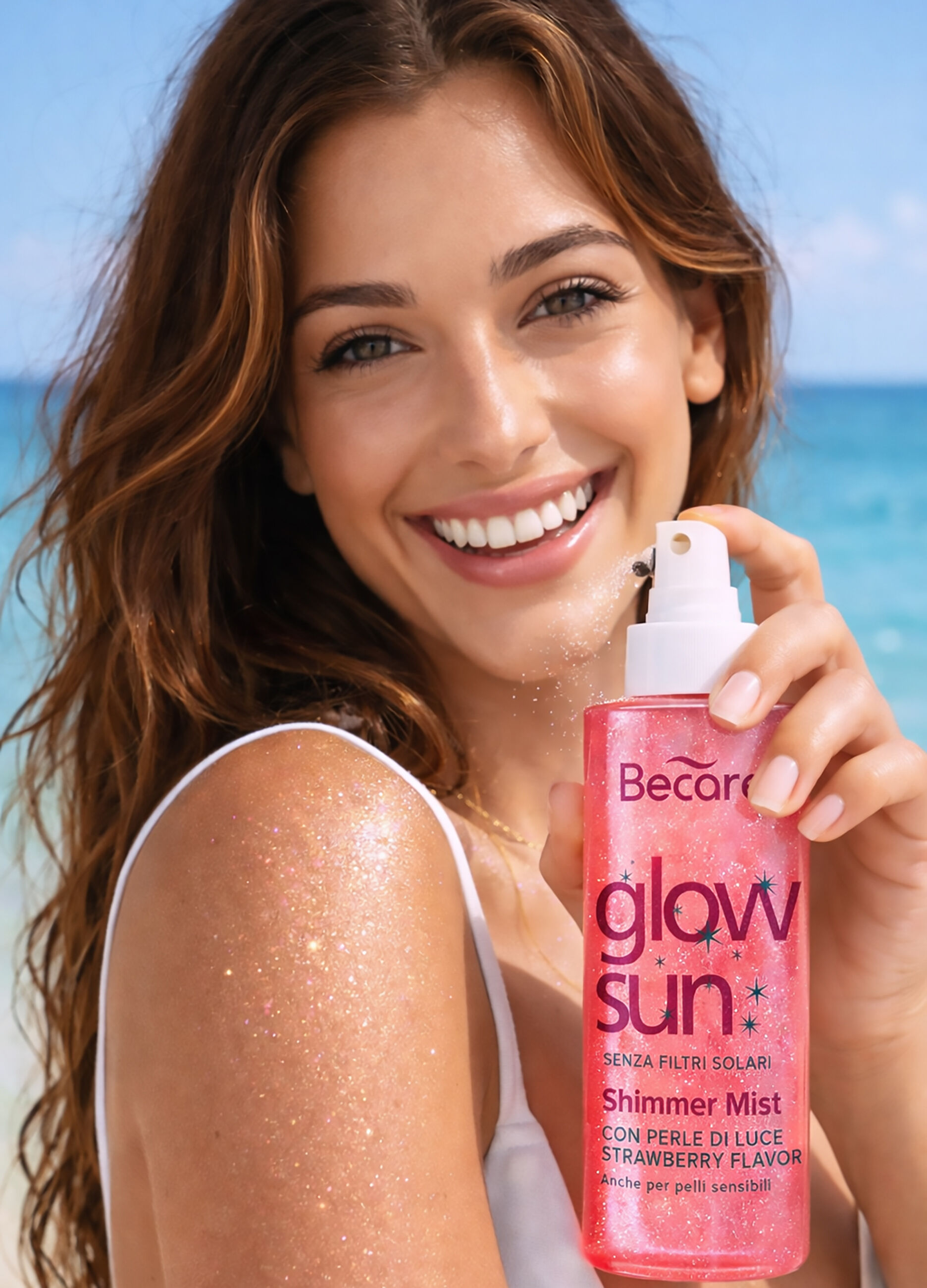 Acqua corpo profumata che risalta l'abbronzatura, rinfresca la pelle e la rende radiosa grazie alla presenza di perle luminose. Fragranza intensa alla fragola._2