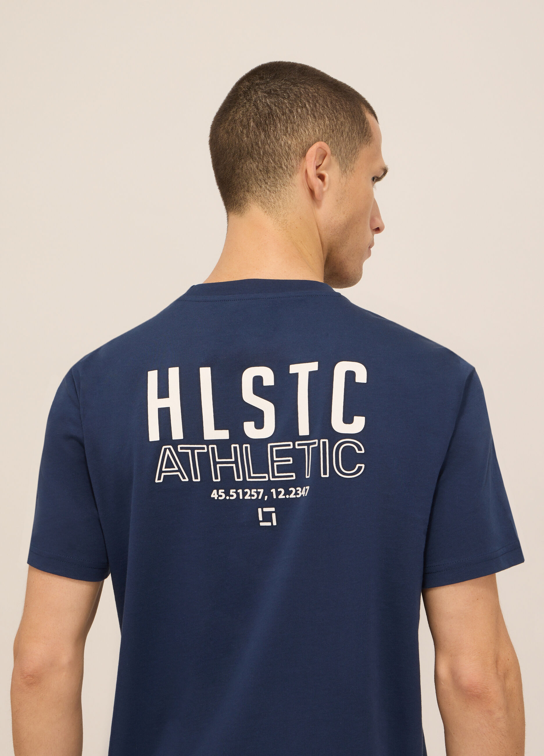 T-shirt sportiva con lettering in cotone uomo_2