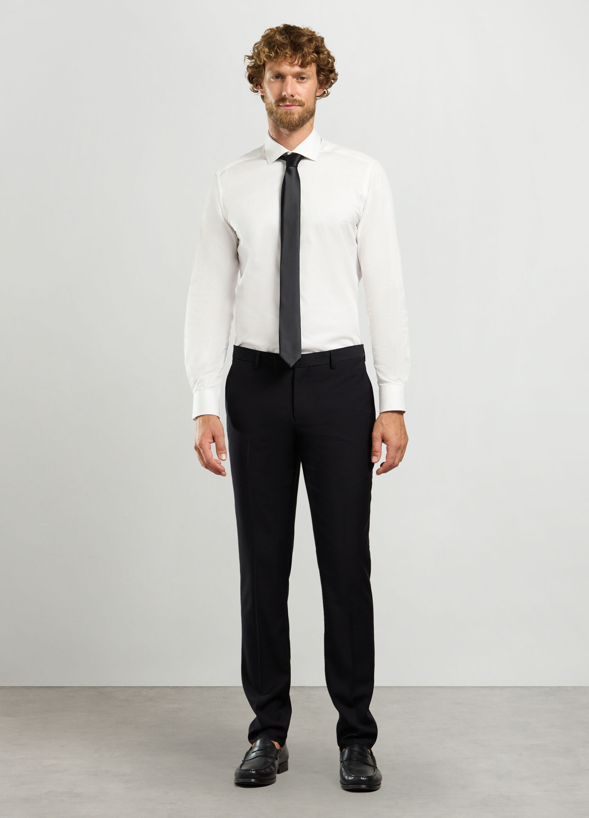 Pantalone slim fit in tessuto stretch uomo_0