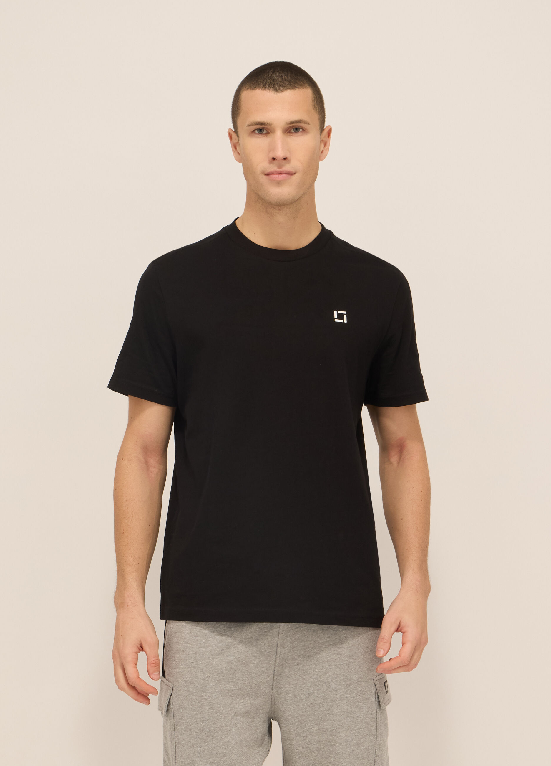 T-shirt sportiva con lettering in cotone uomo_0