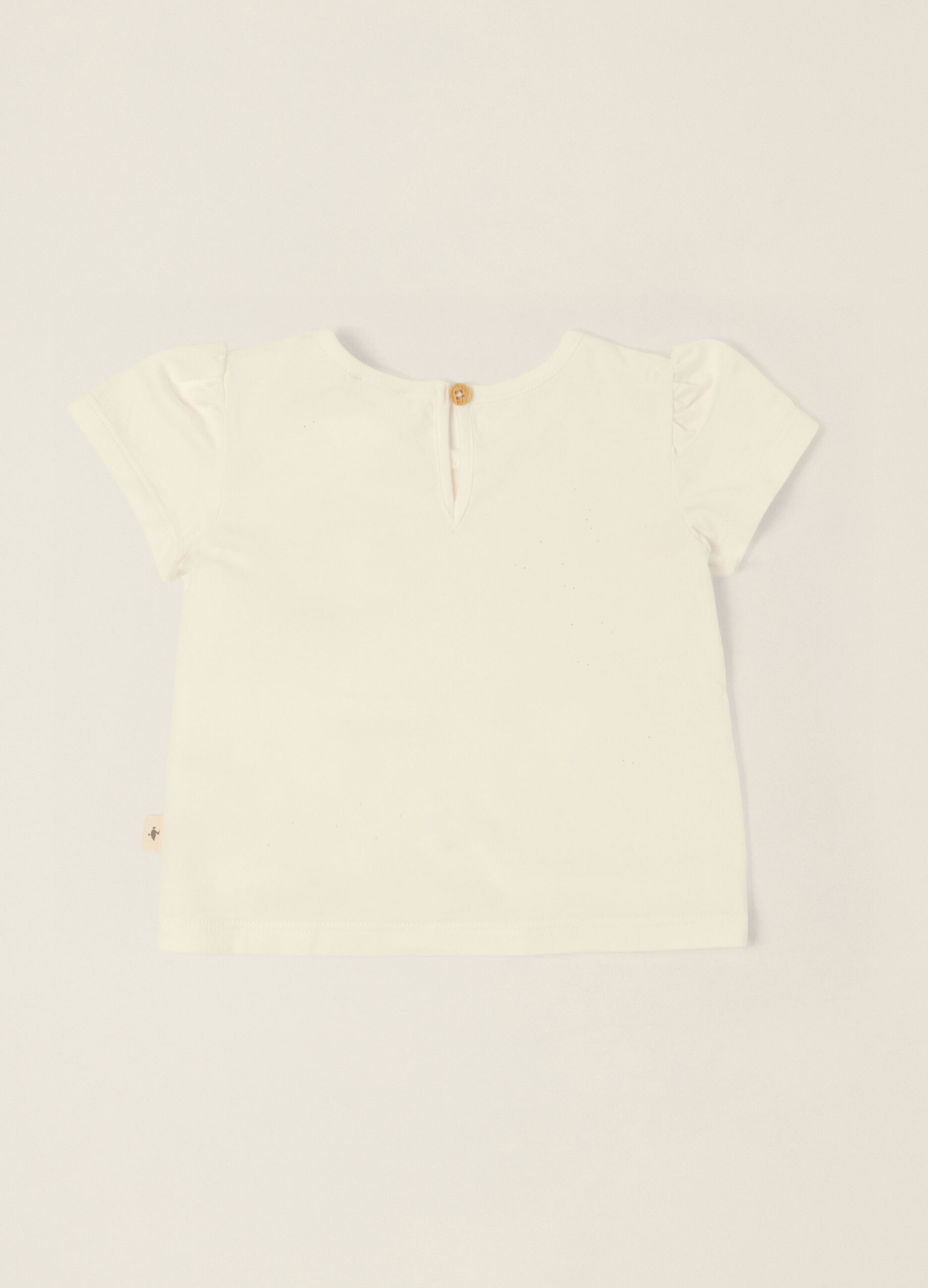 T-shirt bianca in cotone organico con fiori ricamati_1