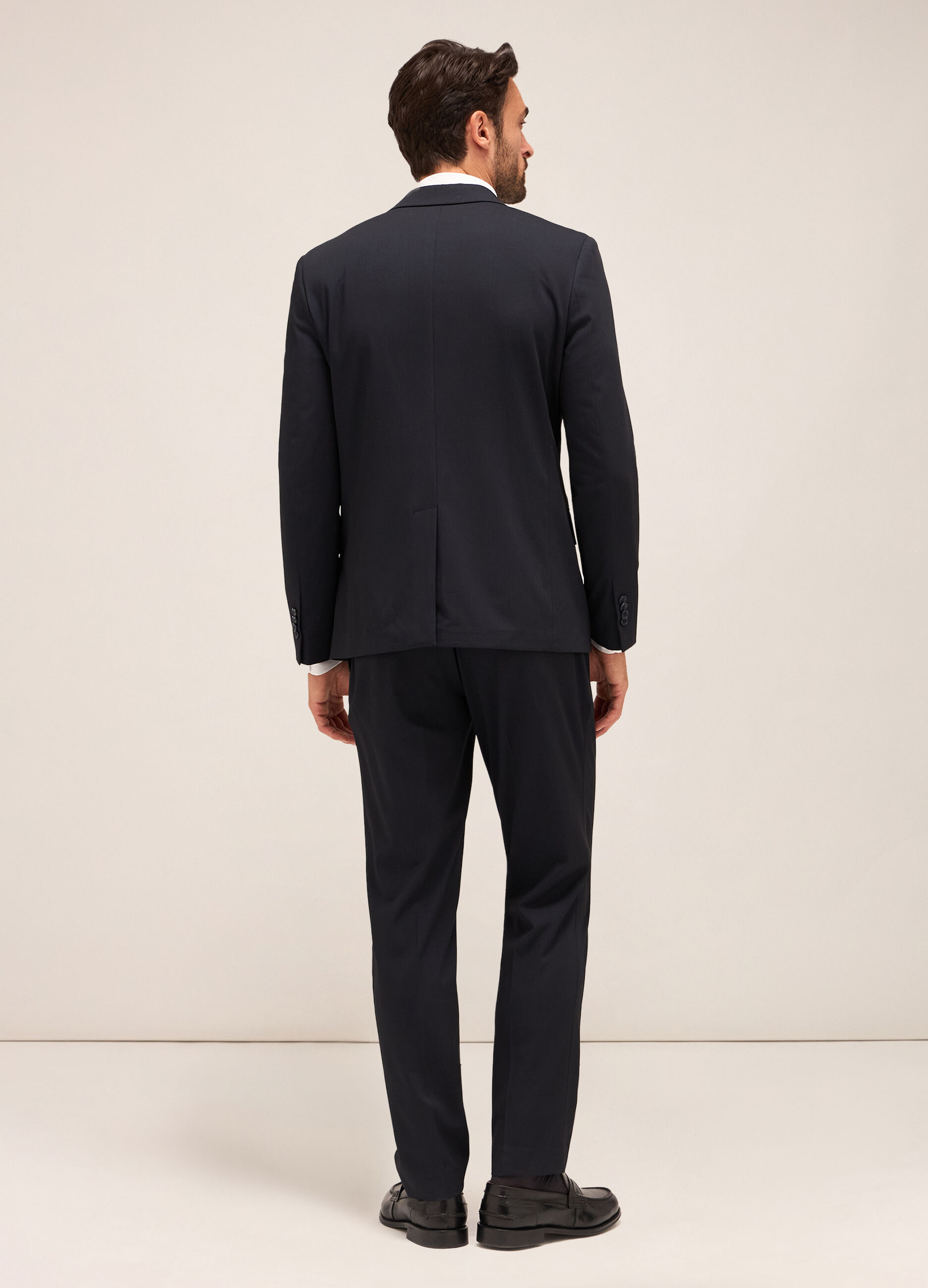 Pantalone slim fit in tessuto tecnico stretch uomo