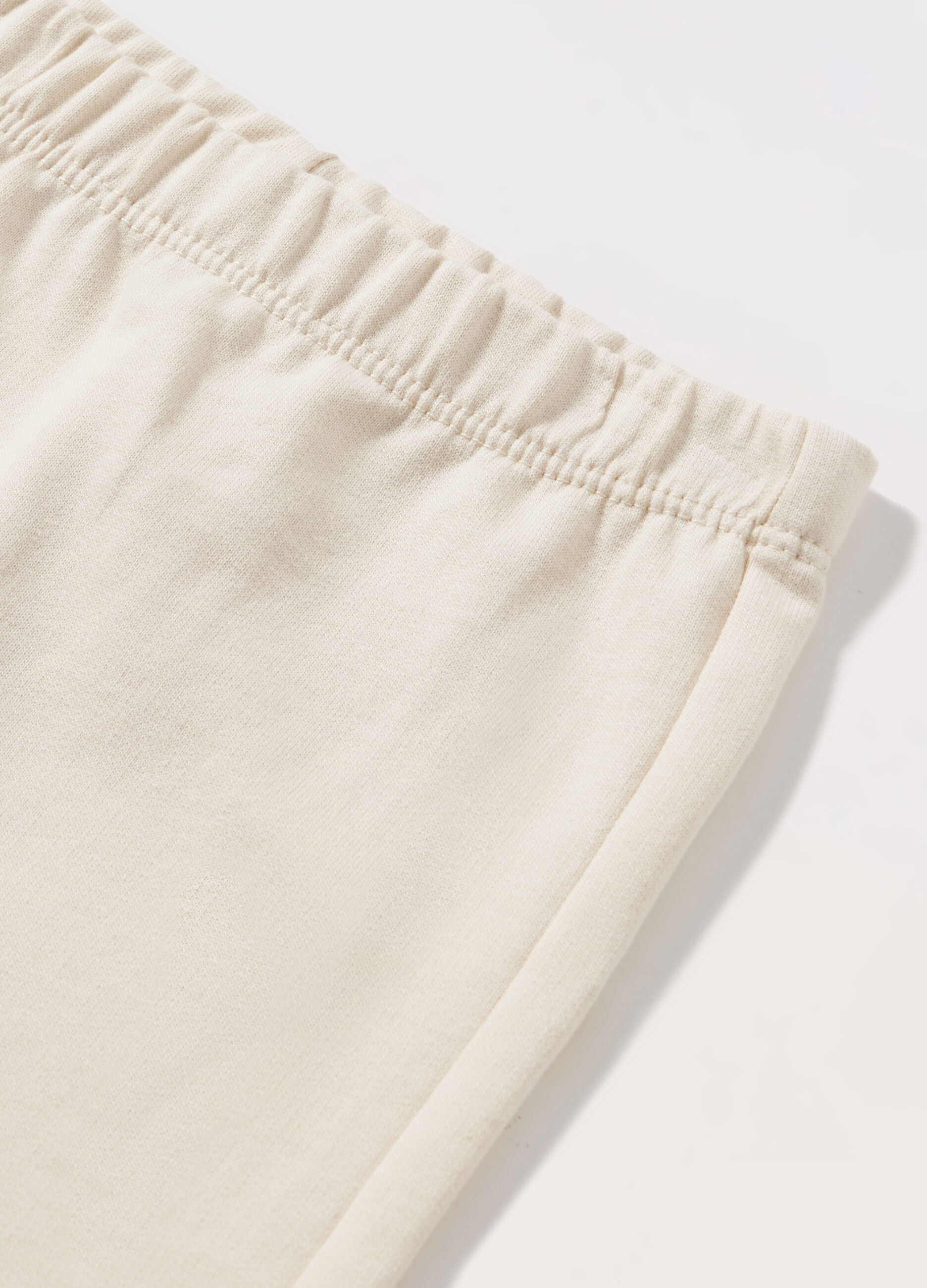 Joggers in french terry di puro cotone neonato_1