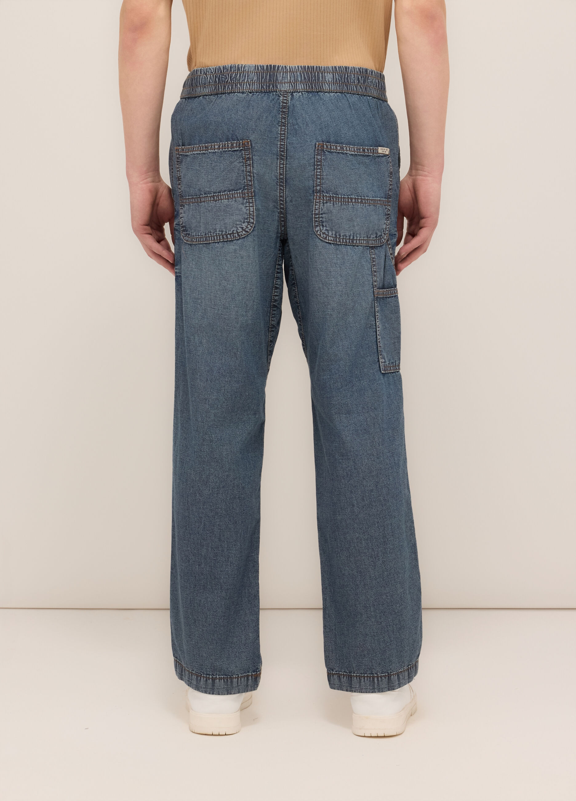 Jeans over in denim di cotone uomo_1