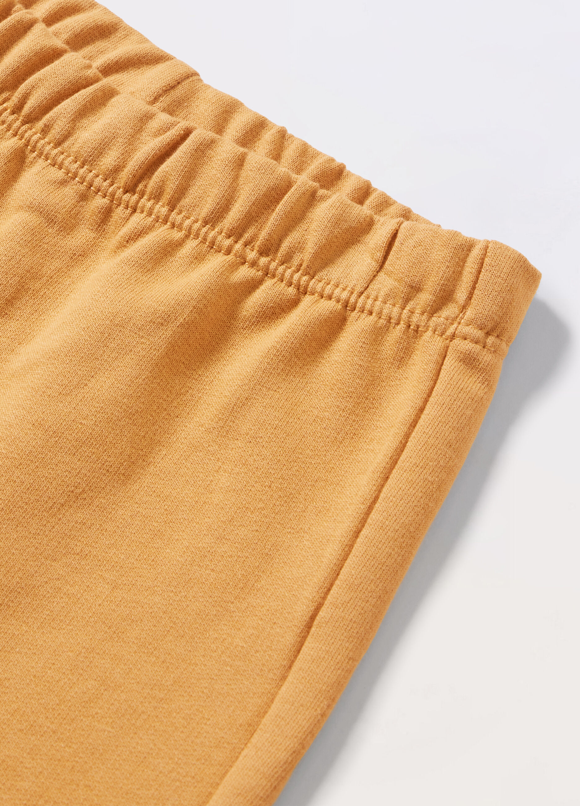Joggers in french terry di puro cotone neonato_1