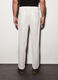 Pantalone con pince e coulisse in cotone e lino uomo_1