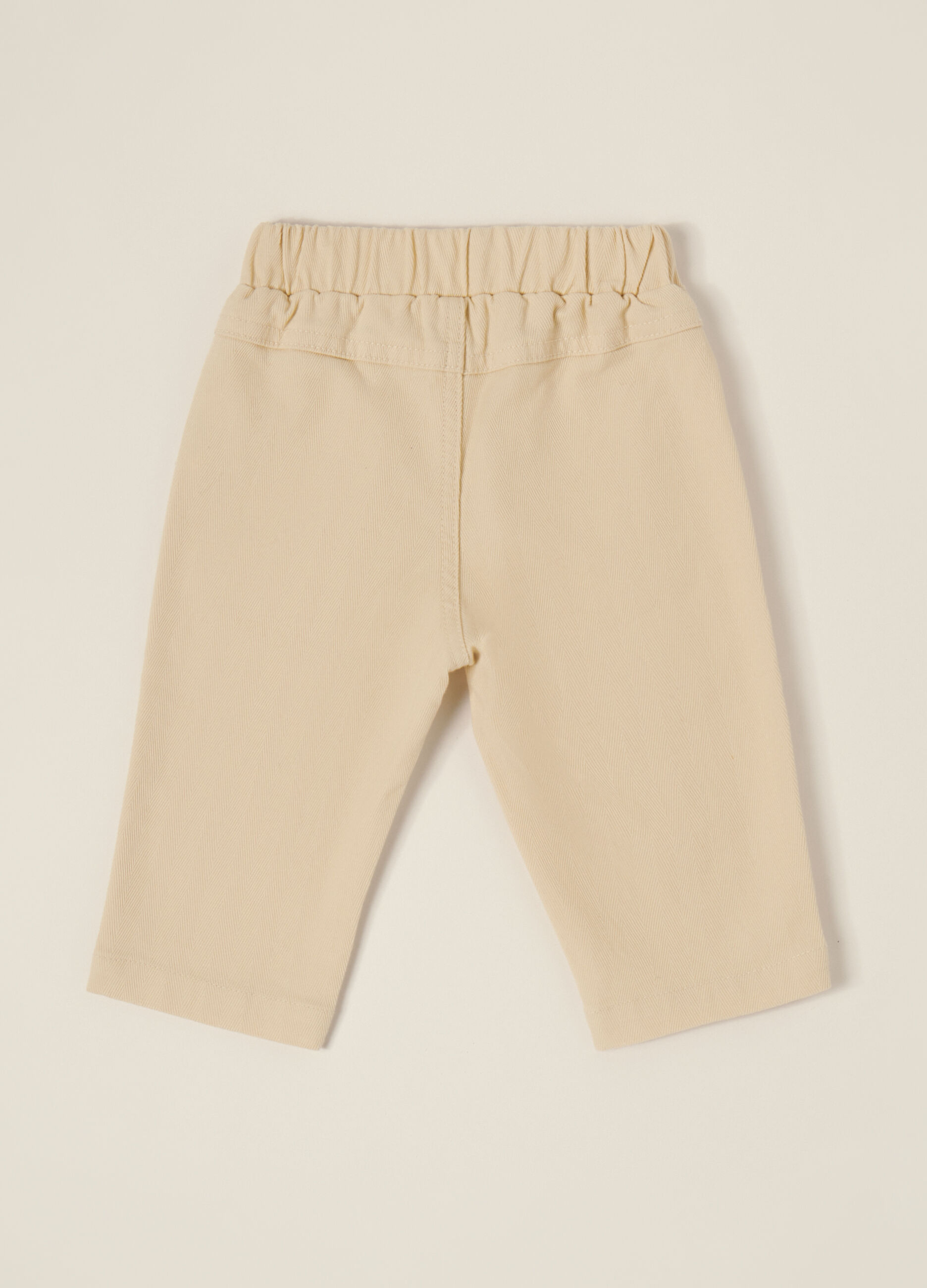 Pantaloni beige elasticizzati per neonato_1