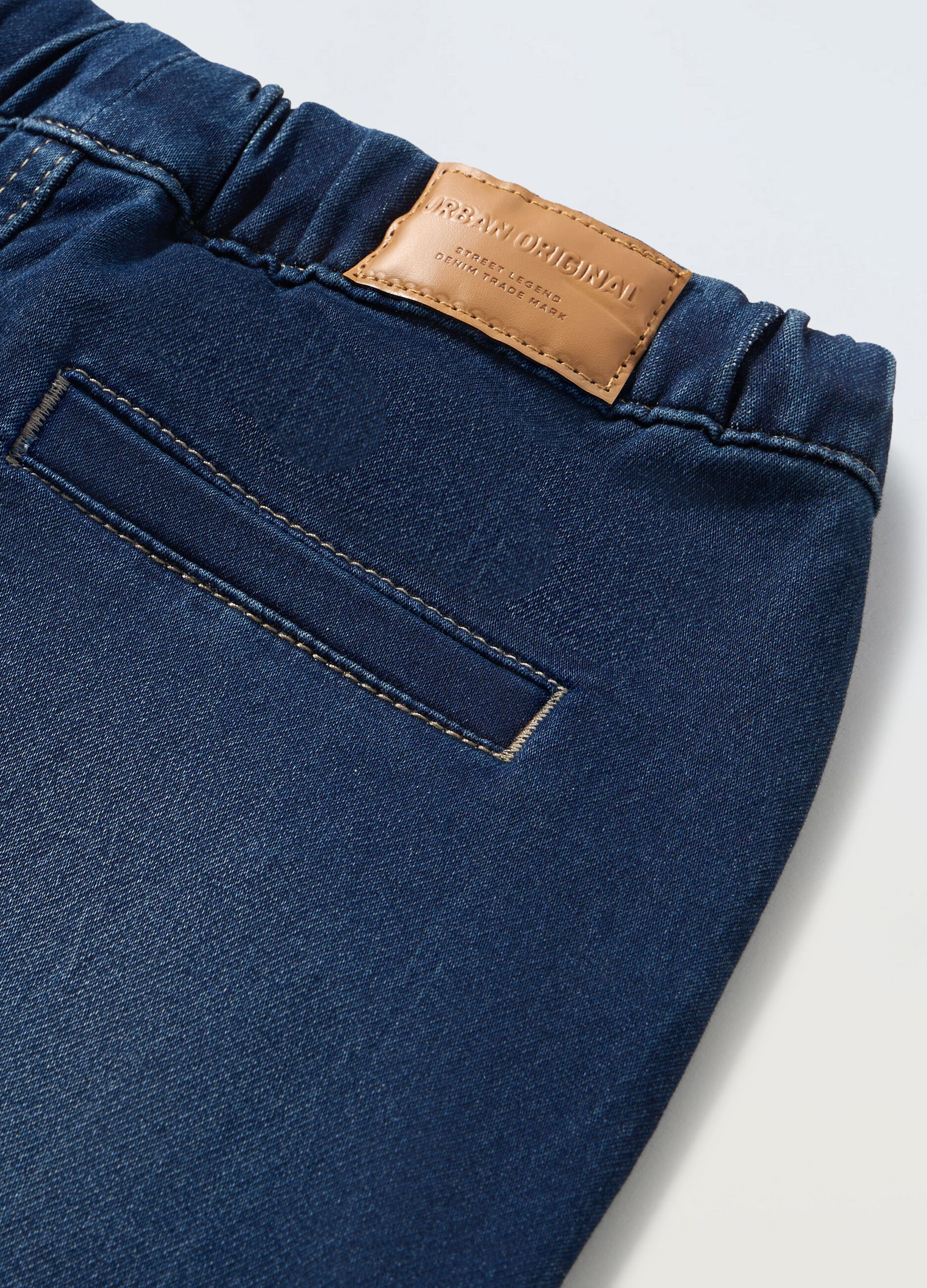 Jogger in denim di misto cotone ragazzo_1