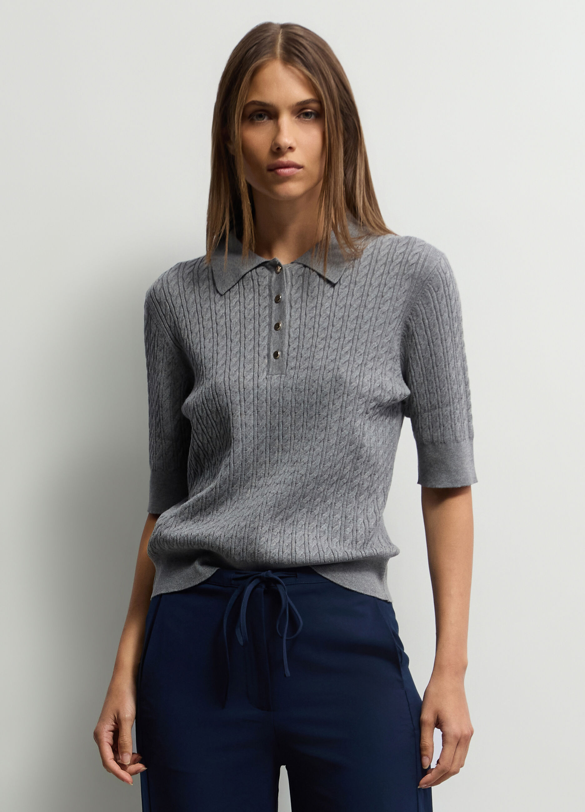 Polo con lavorazione a treccia donna_0