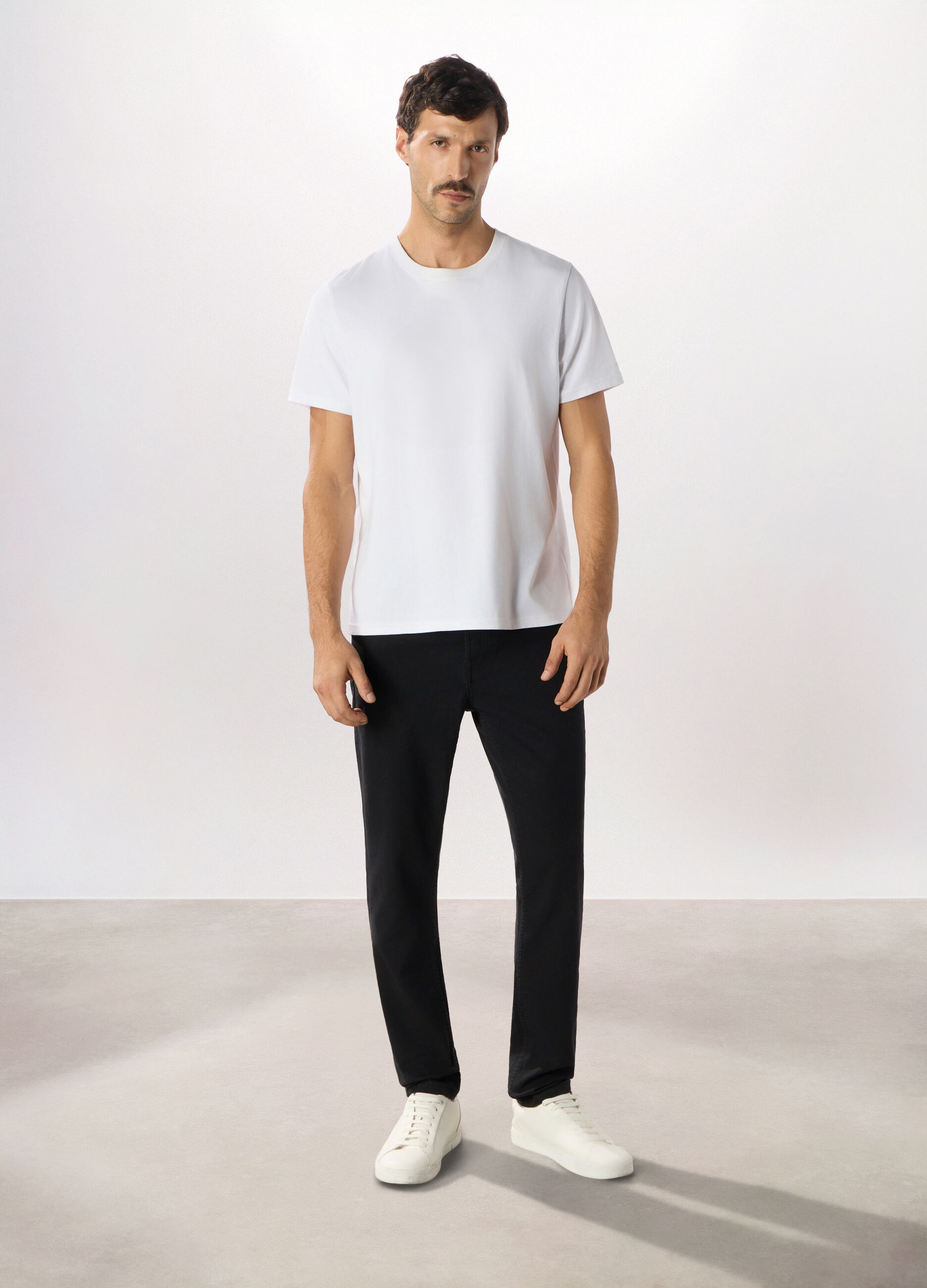 Jeans slim fit in cotone stretch uomo_0