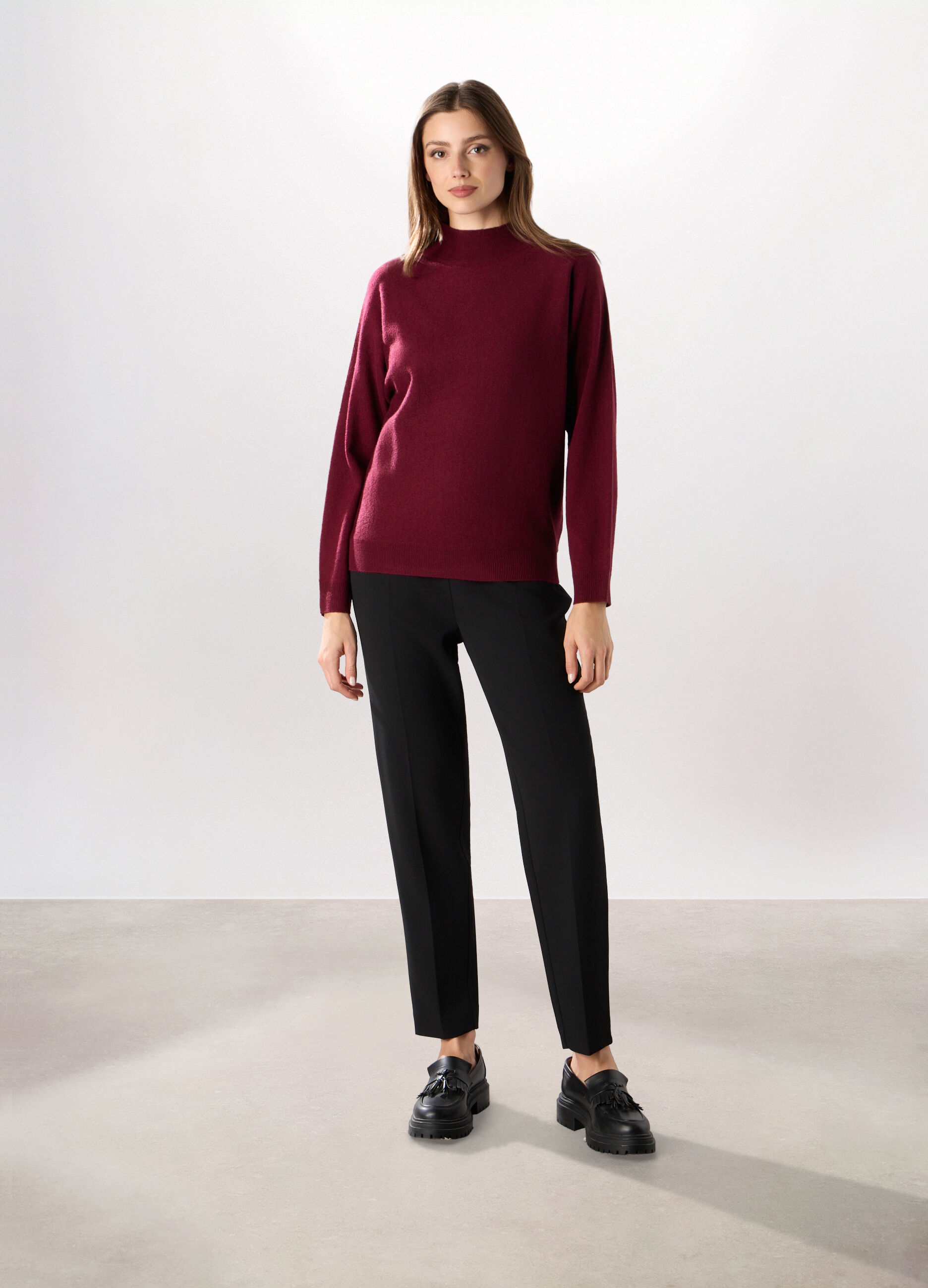 Pantaloni con zip donna_0