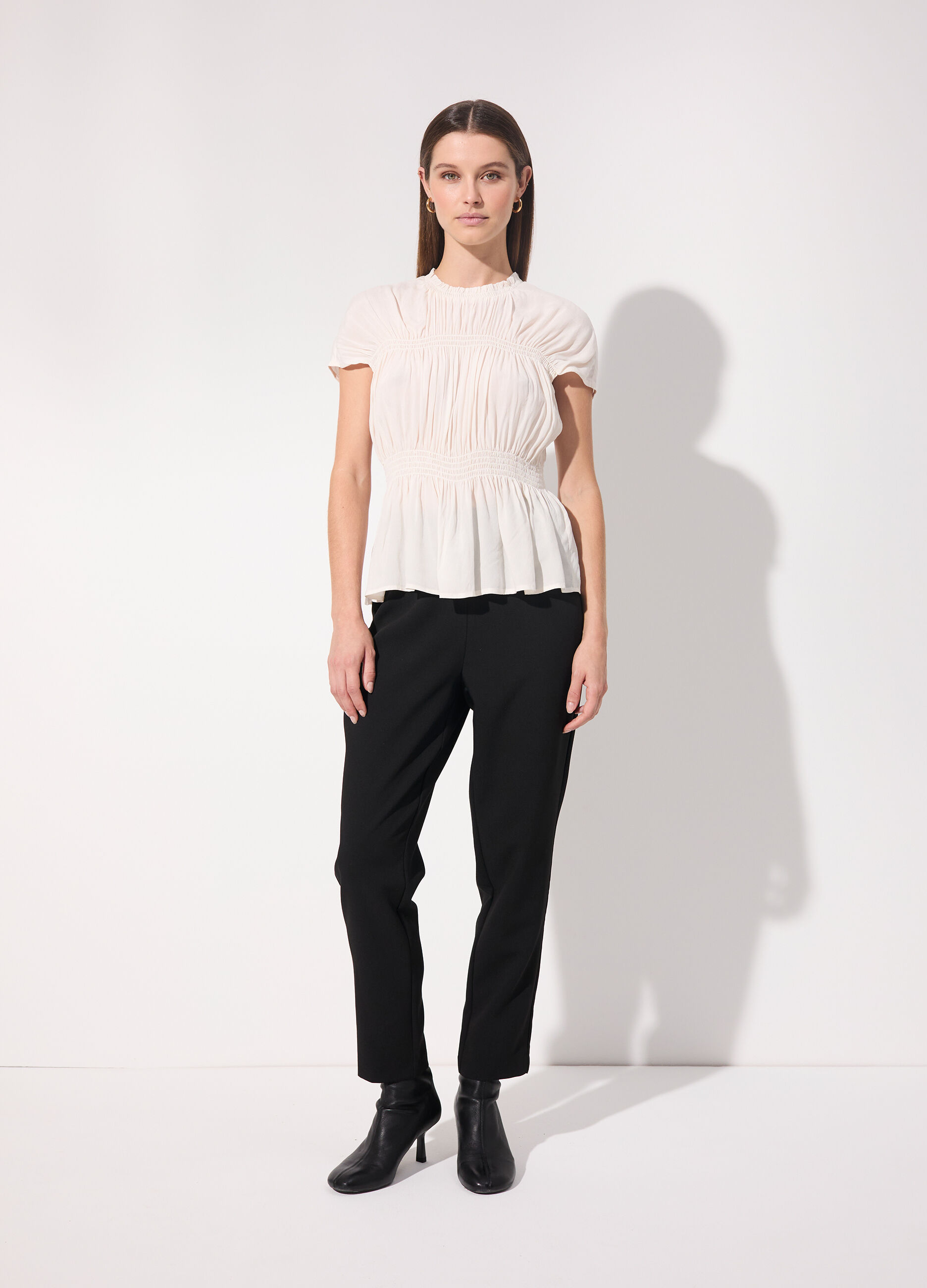 Blusa arricciata in punto smock donna_0