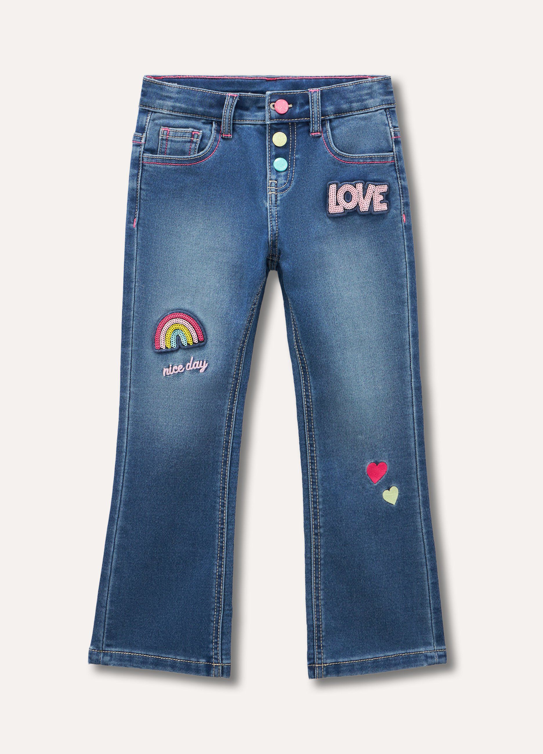 Jeans con ricami e applicazioni bambina_0
