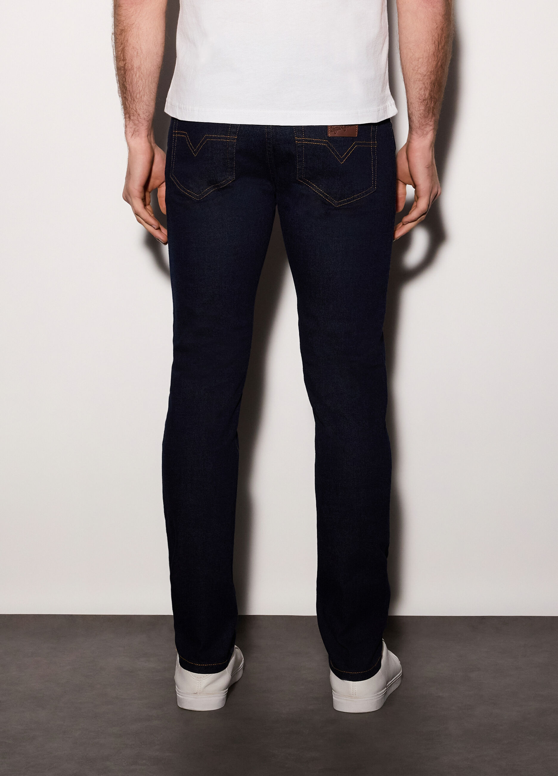 Jeans slim fit in denim di cotone elasticizzato uomo_1