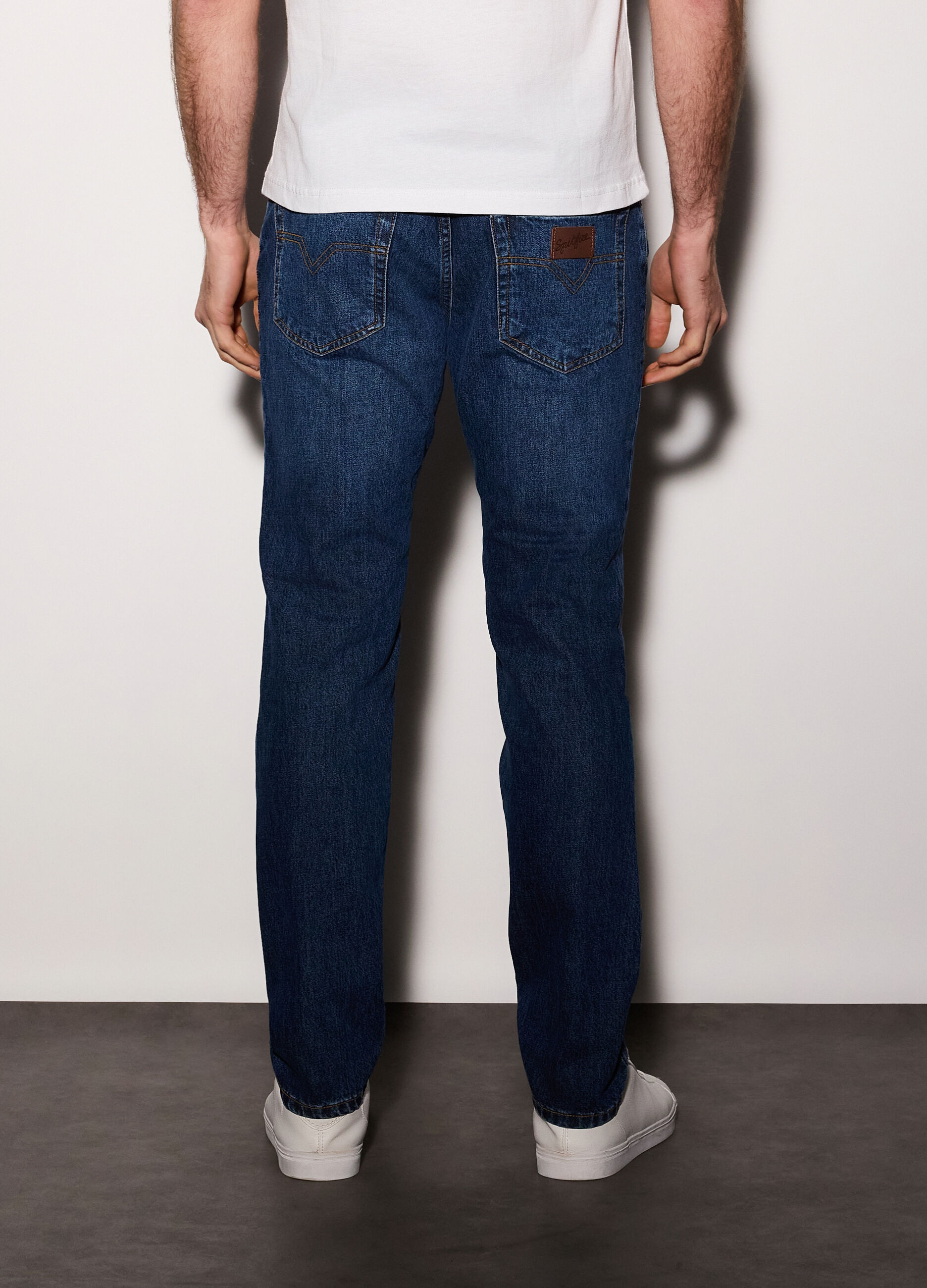 Jeans slim fit in denim di cotone elasticizzato uomo_1