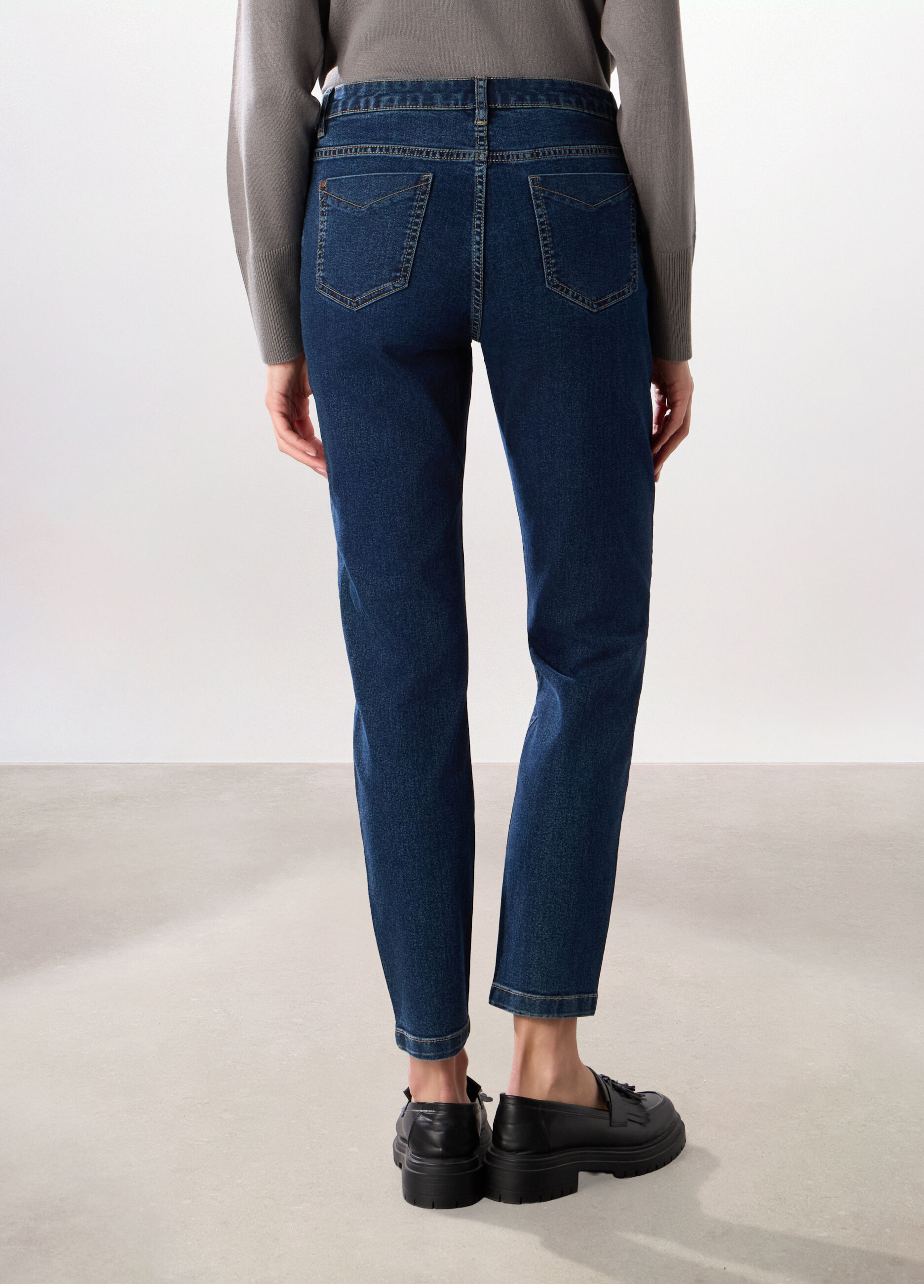Pantaloni in denim misto cotone donna_1