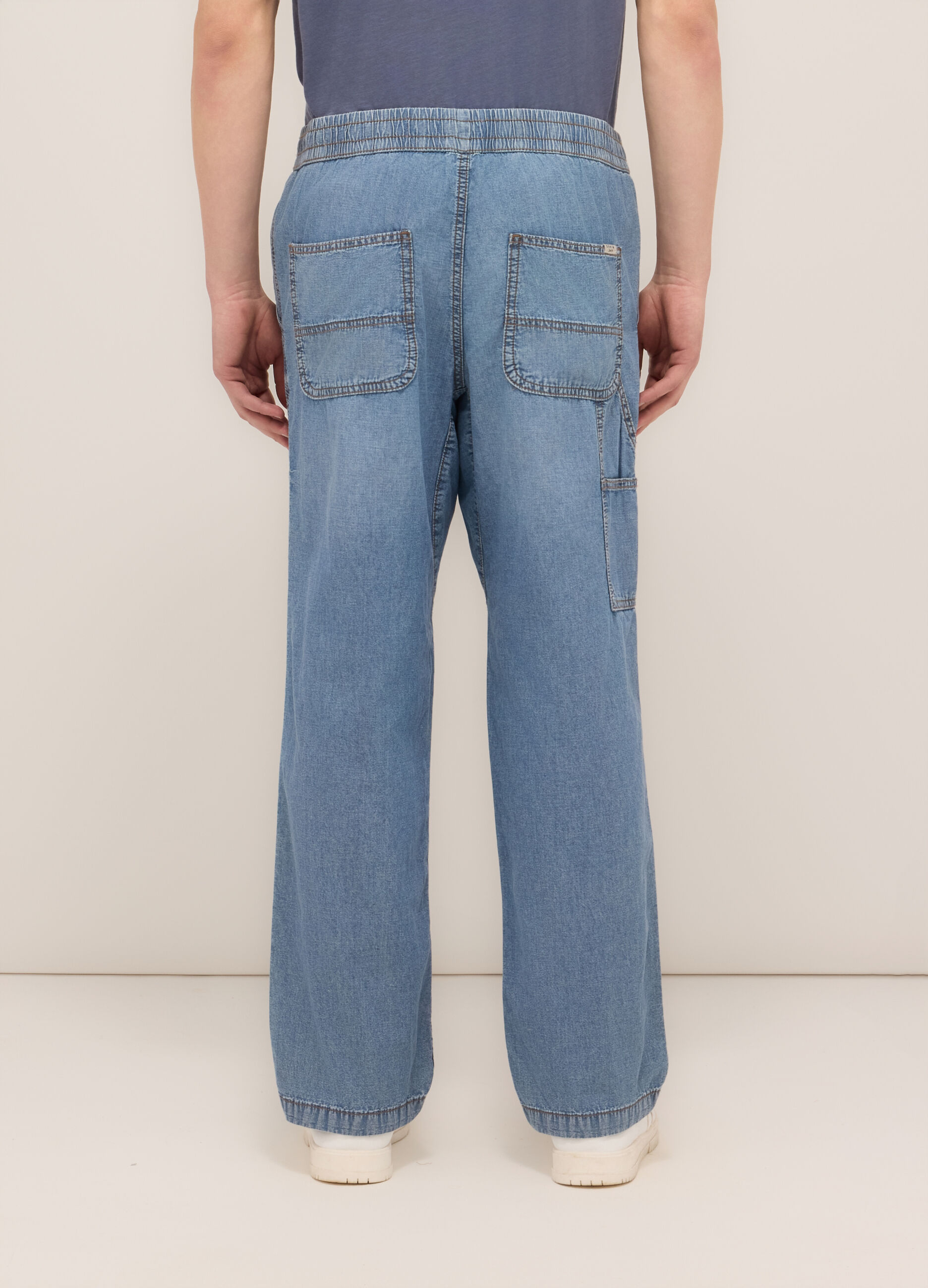 Jeans over in denim di cotone uomo_1
