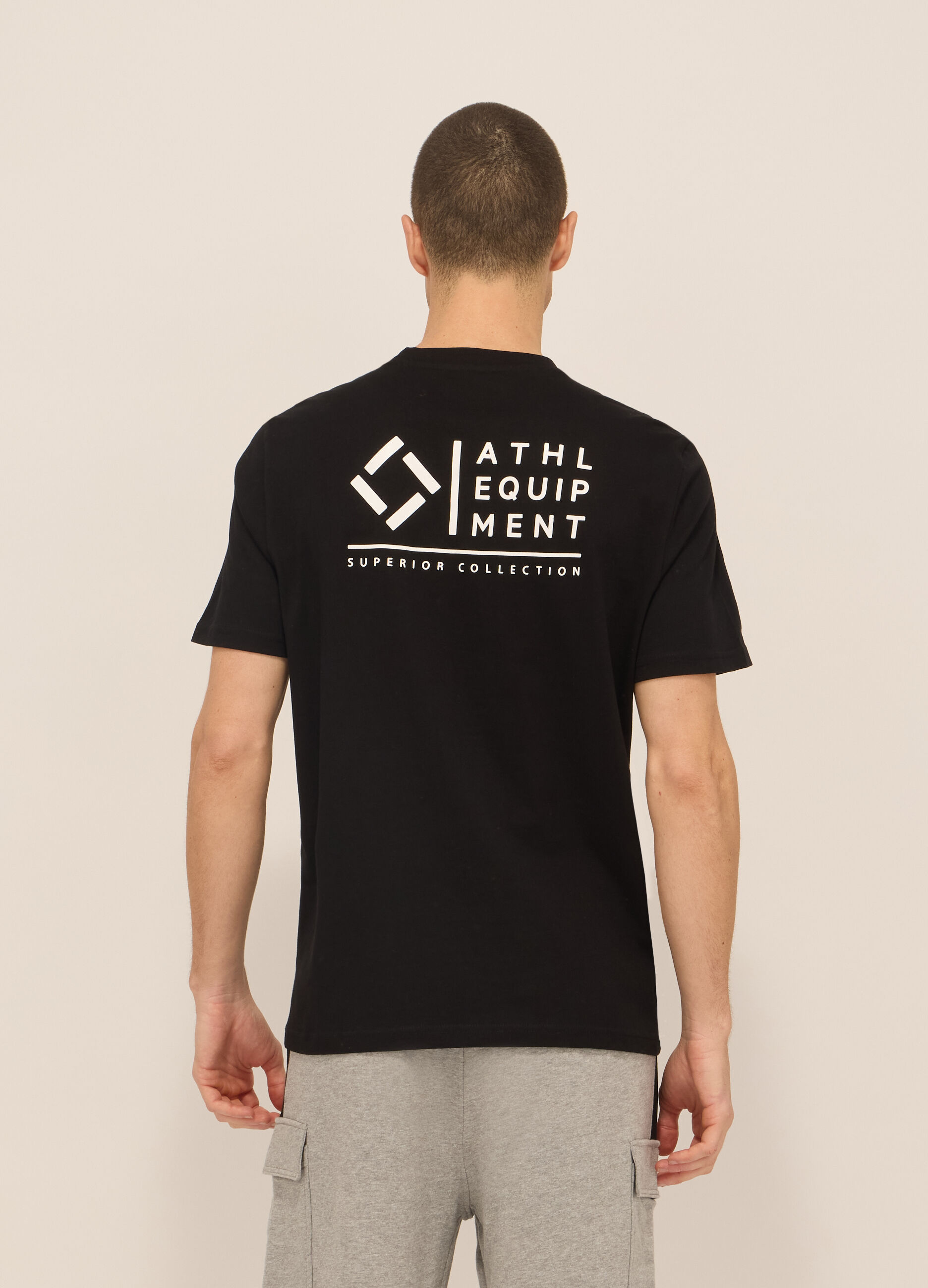 T-shirt sportiva con lettering in cotone uomo_1