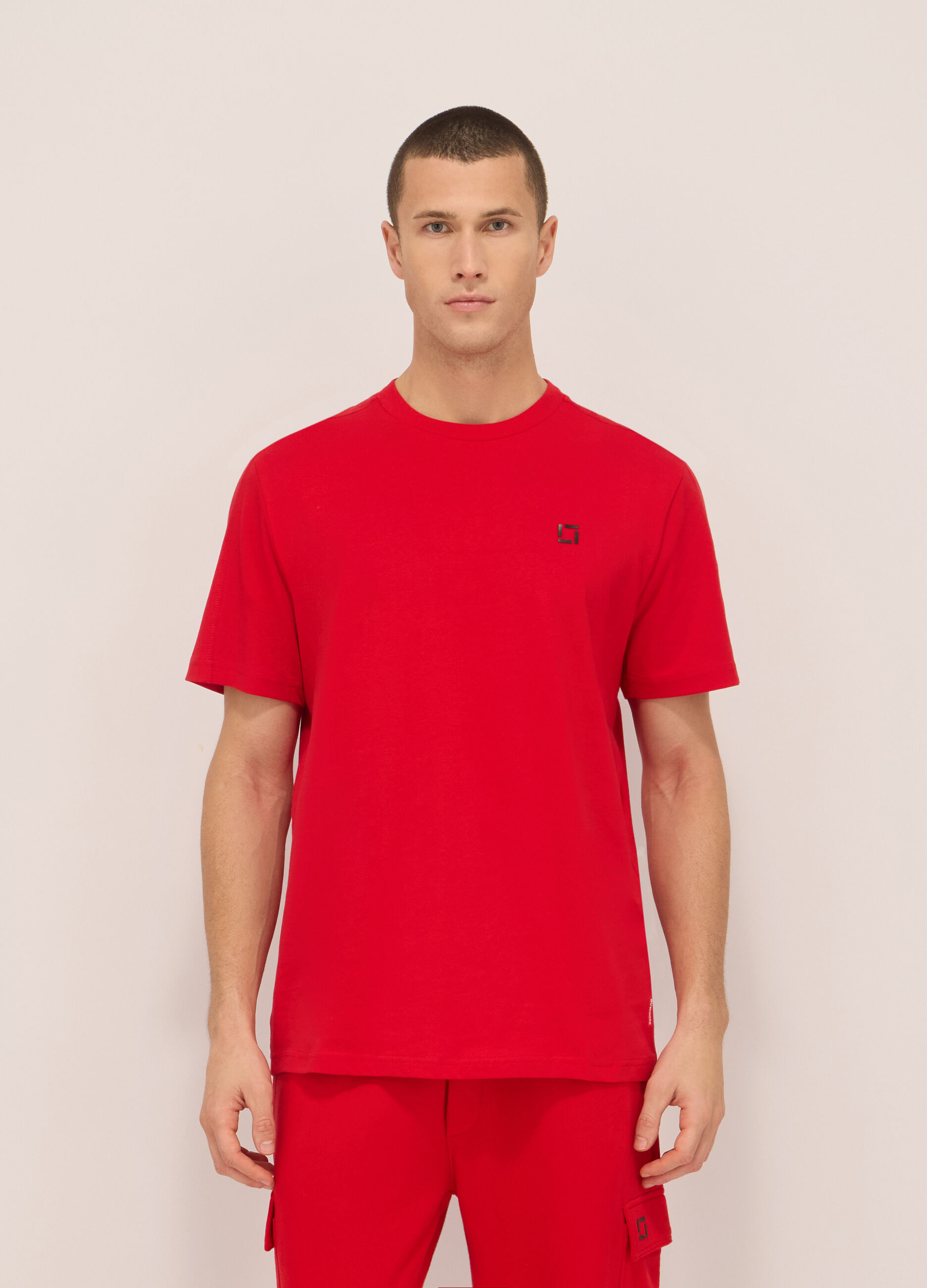 T-shirt sportiva con lettering in cotone uomo_0