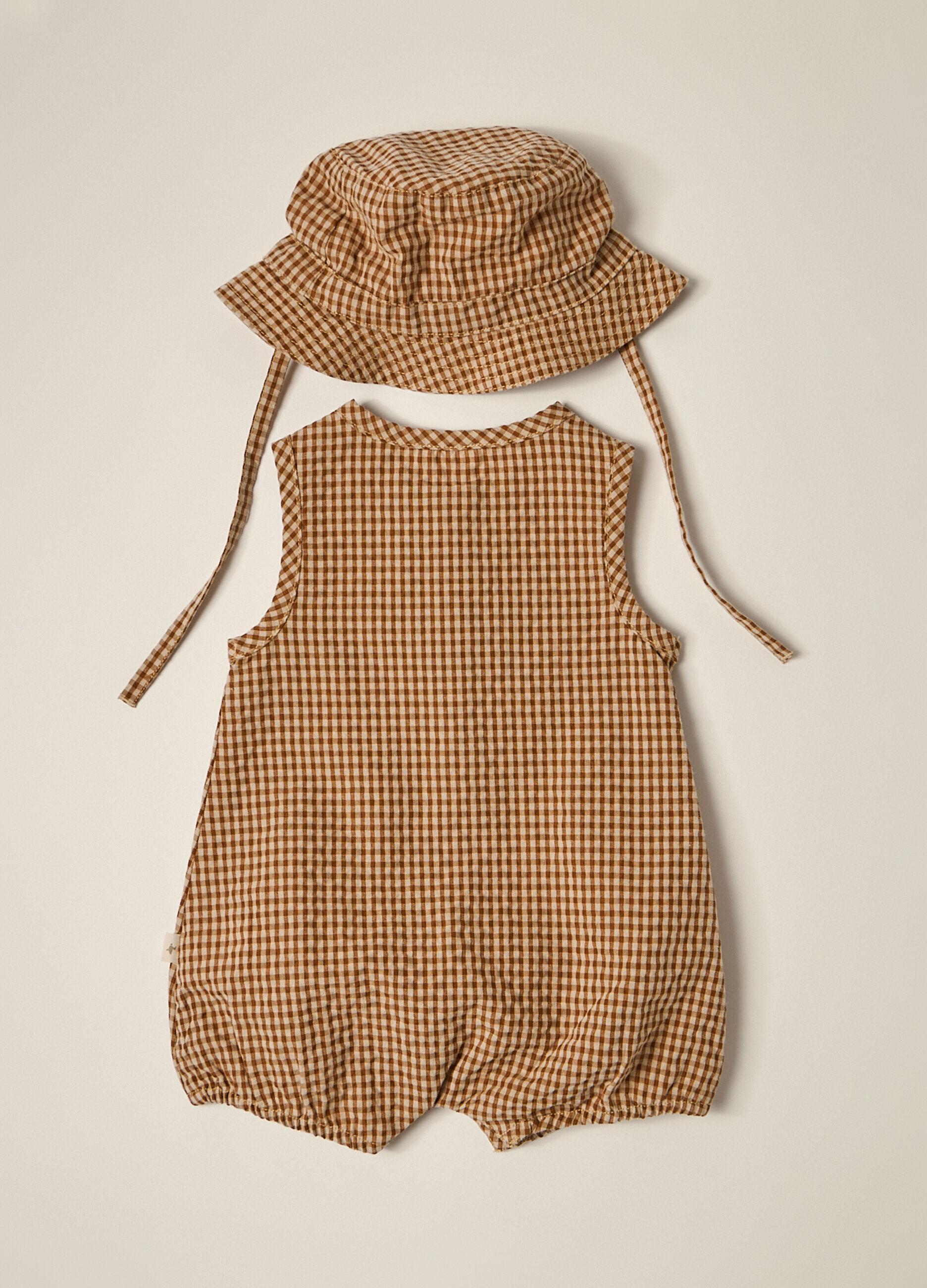 Set cappello e pagliaccetto a quadri neonato_3
