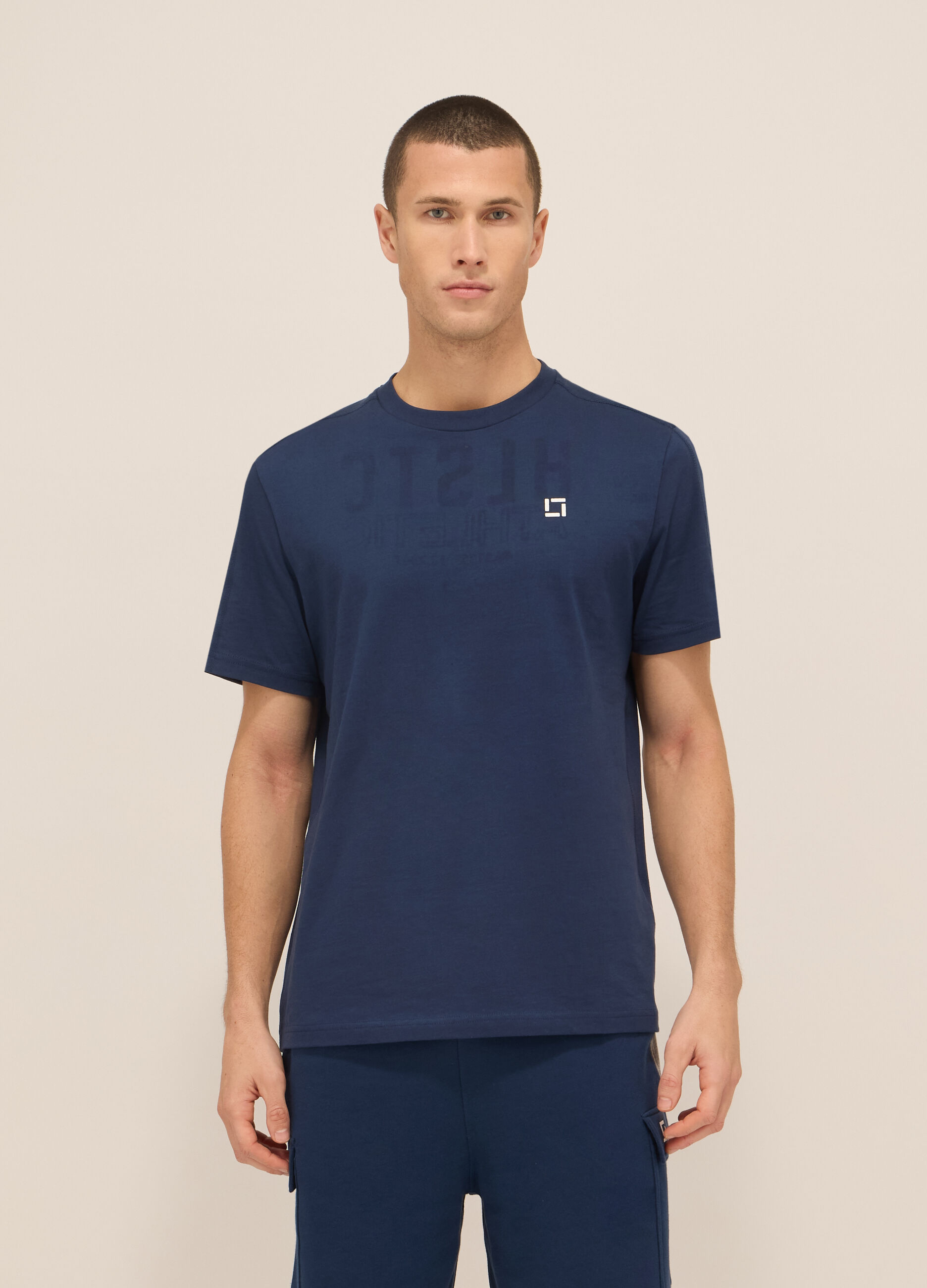 T-shirt sportiva con lettering in cotone uomo_0