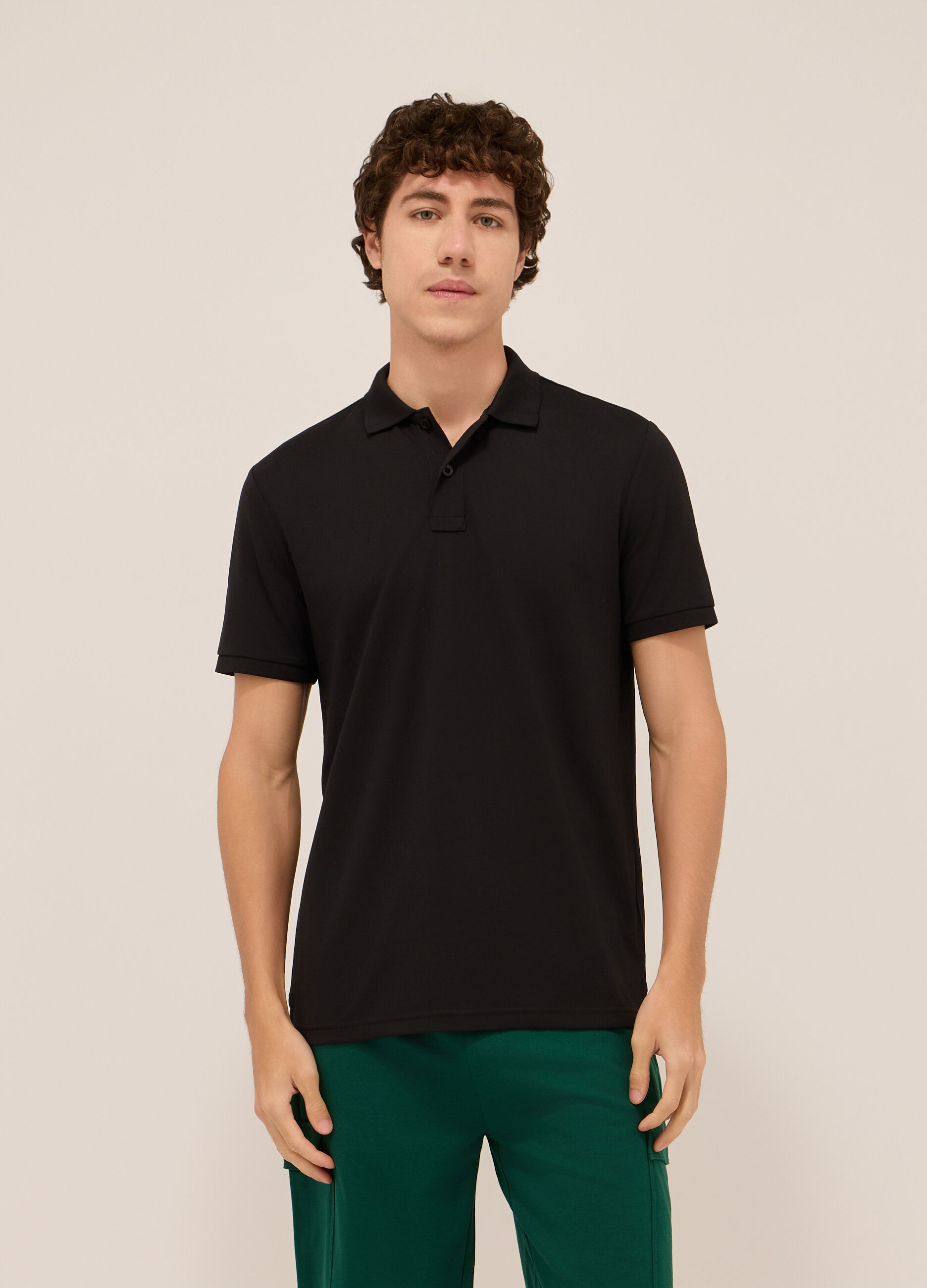 Polo tinta unita in piquet uomo_0