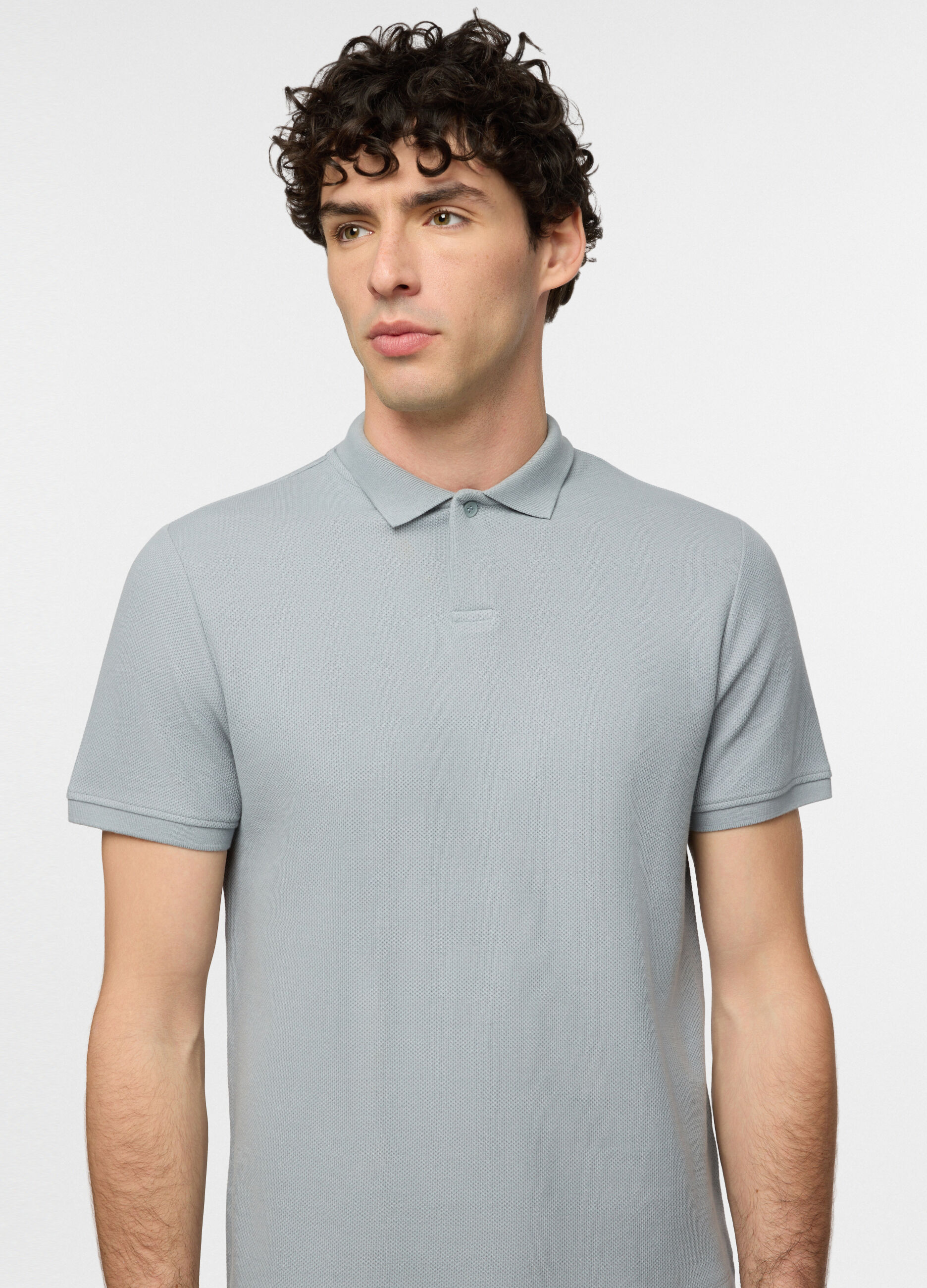 Polo a maniche corte in cotone con allacciatura seminascosta uomo_2