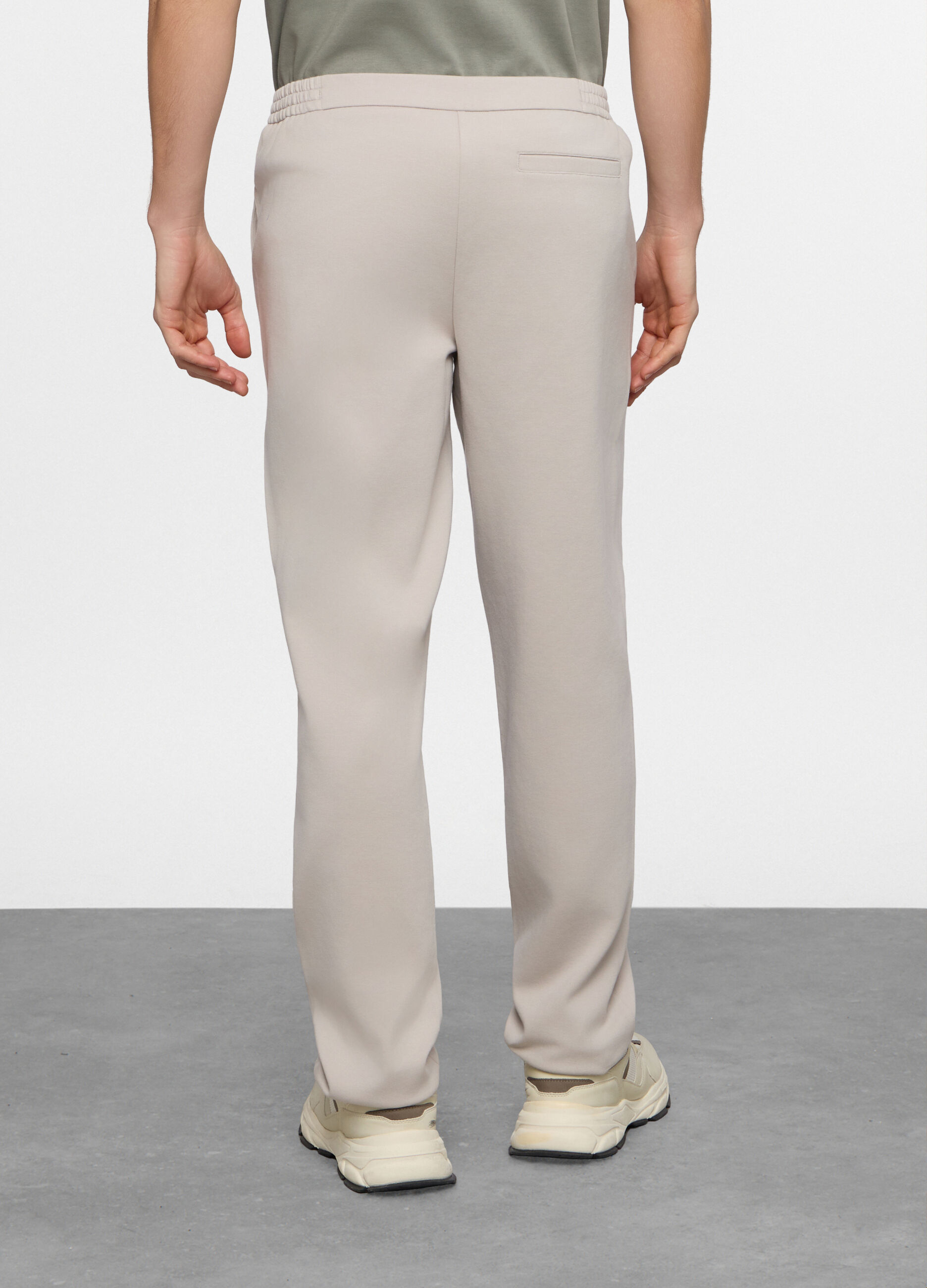 Pantaloni chino in interlock stretch uomo_1