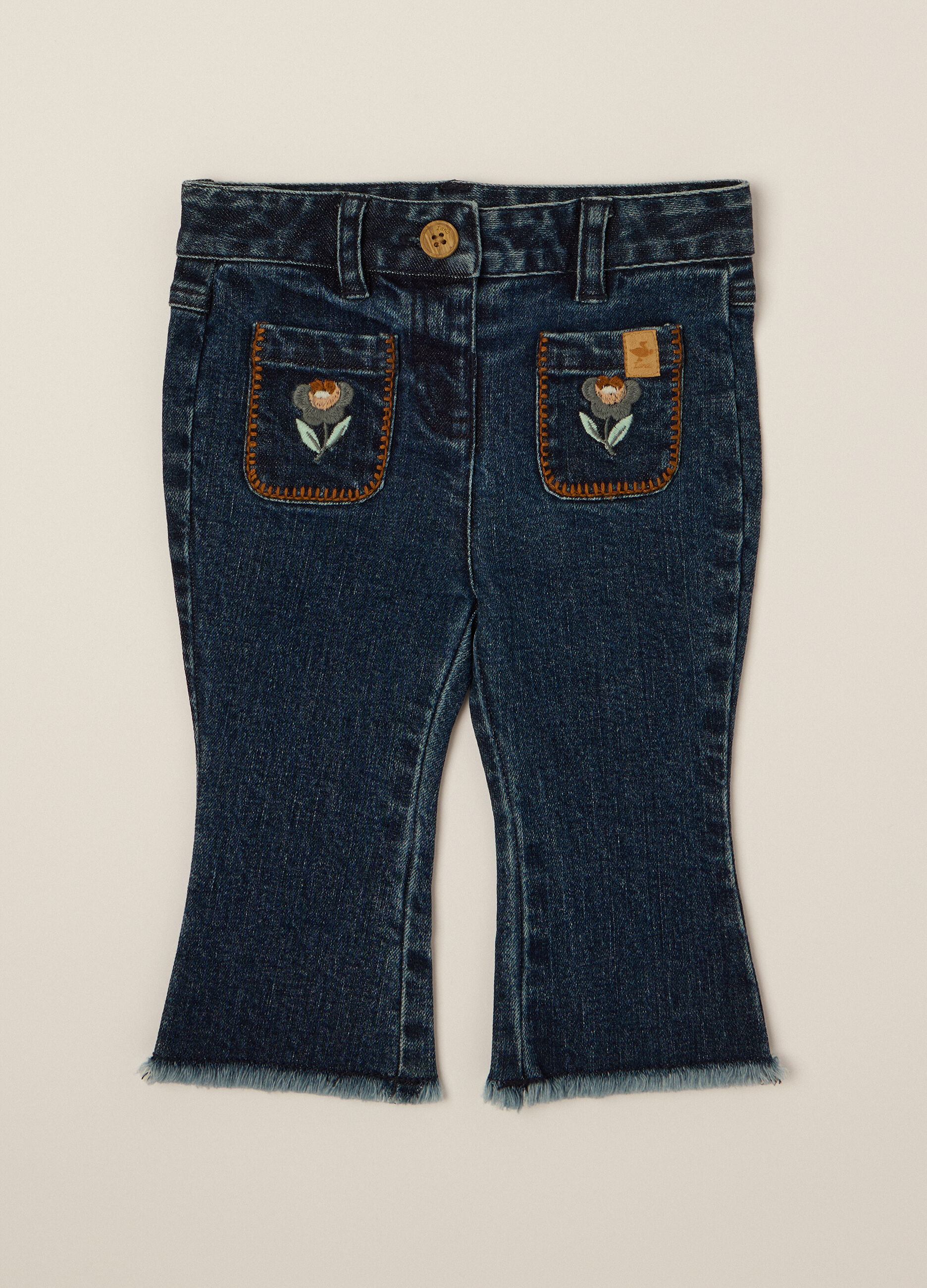 Pantaloni denim elasticizzati a zampa