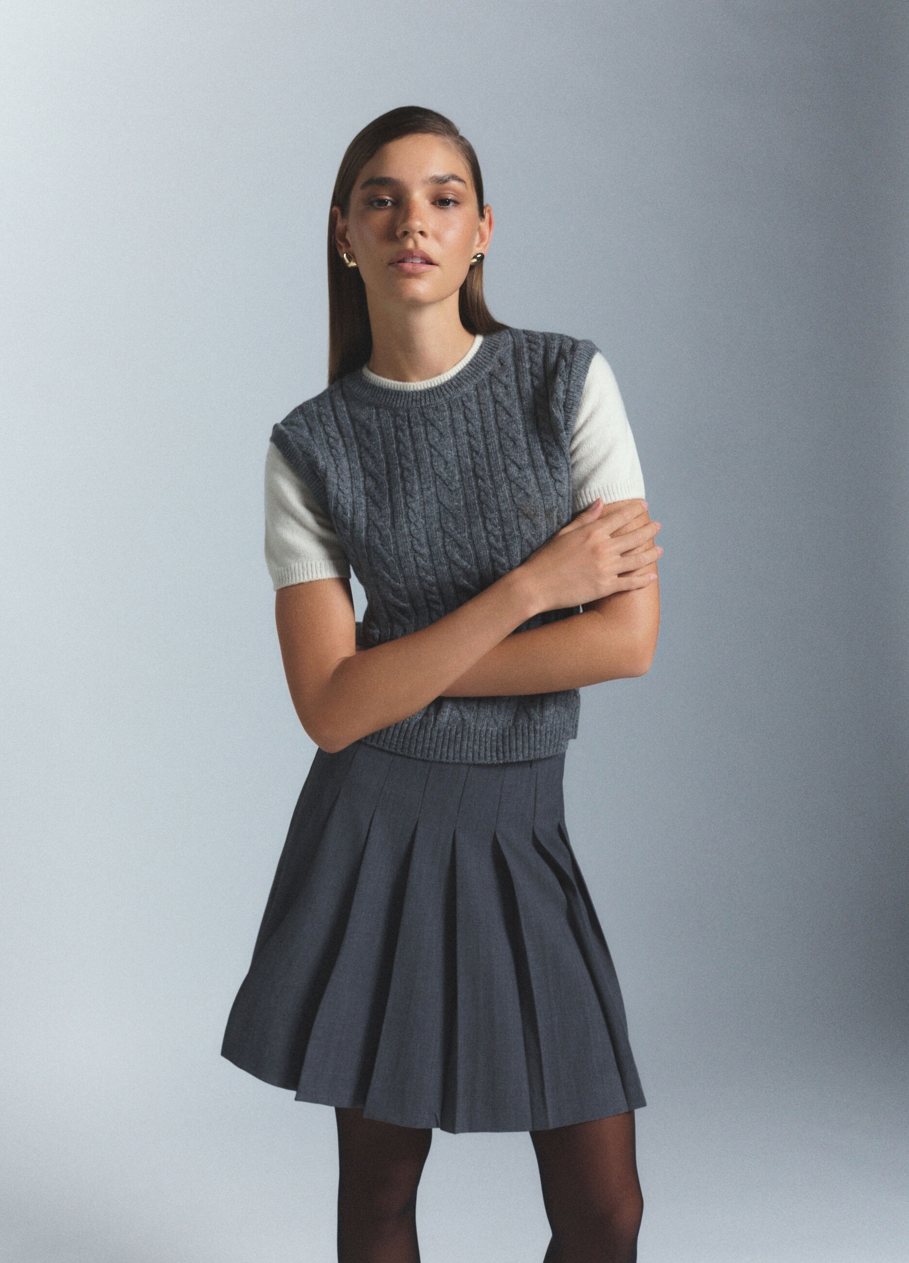 Gilet girocollo con lavorazione a treccia donna_1