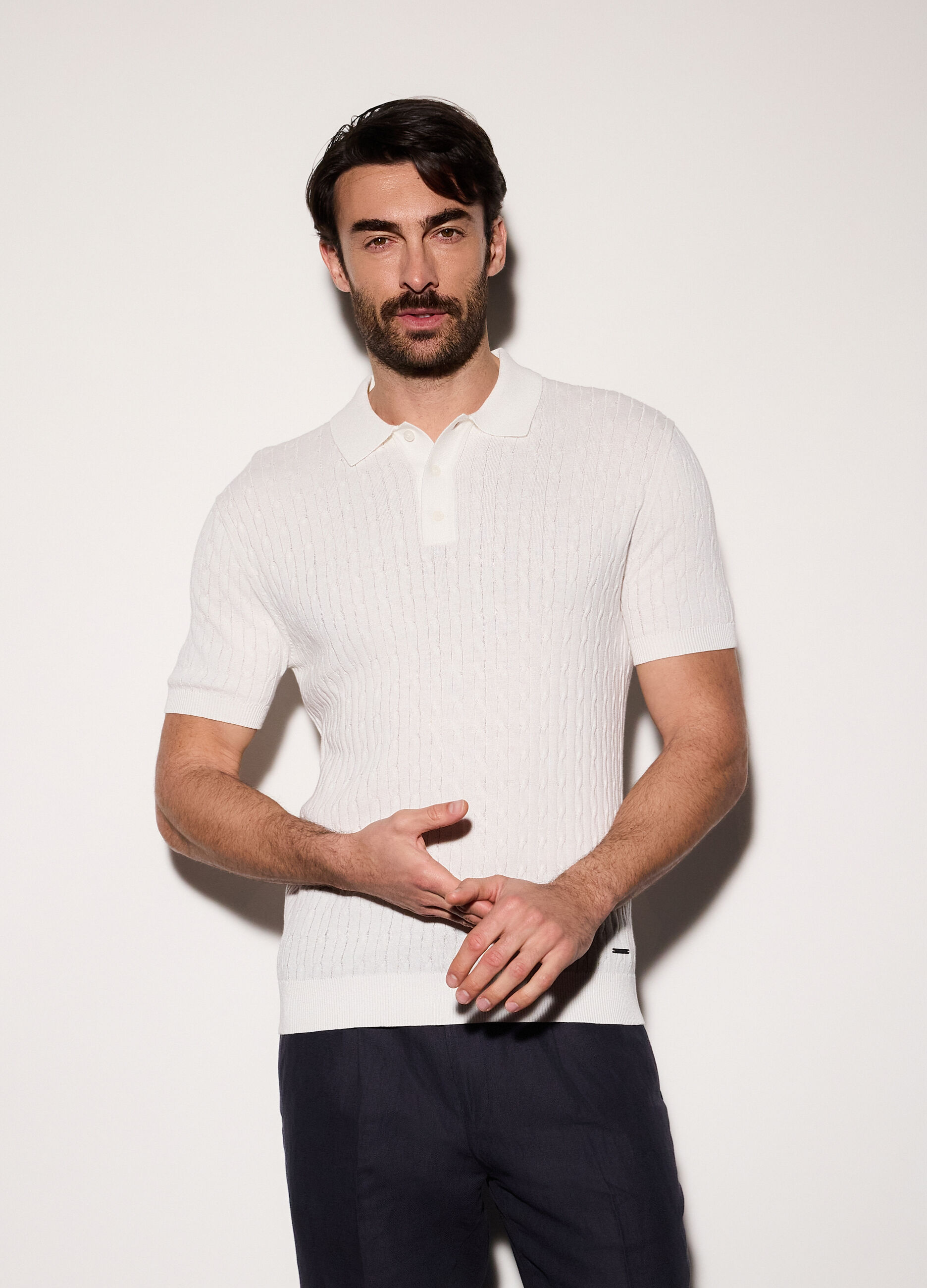 Polo a maniche corte in maglia a treccia uomo_0