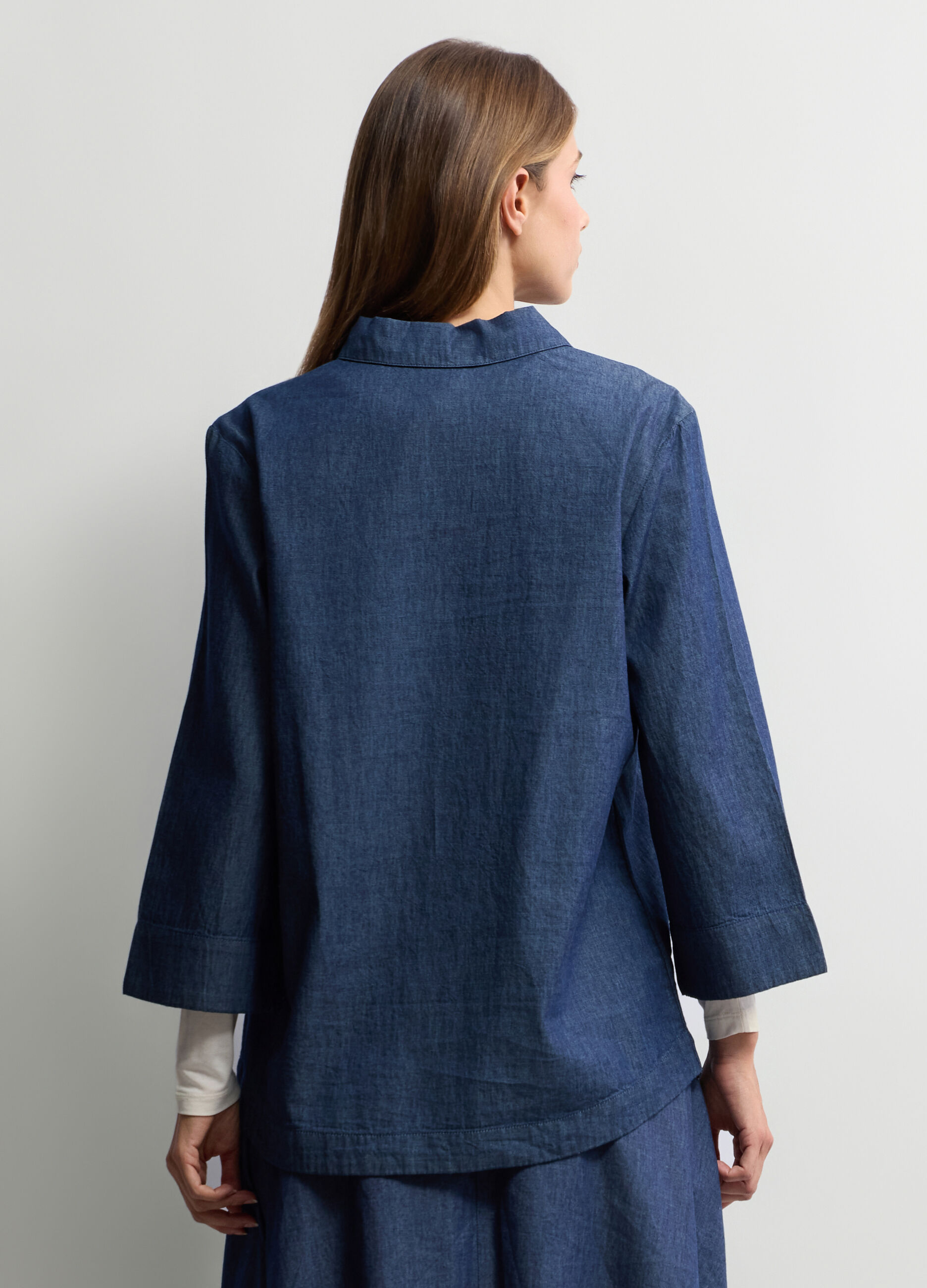 Blusa Fit over con scollo a V donna_1