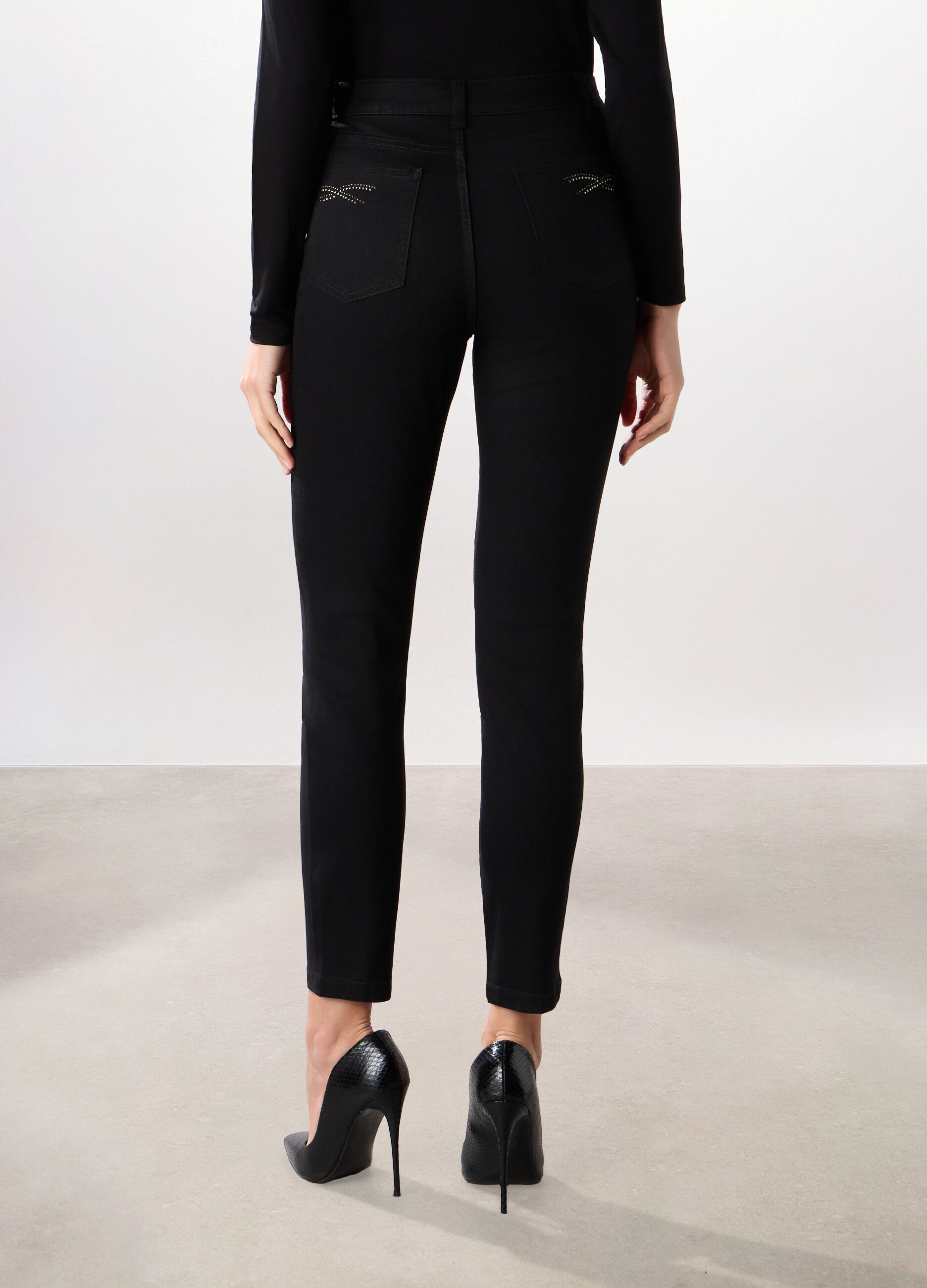 Pantaloni in denim misto cotone donna_1