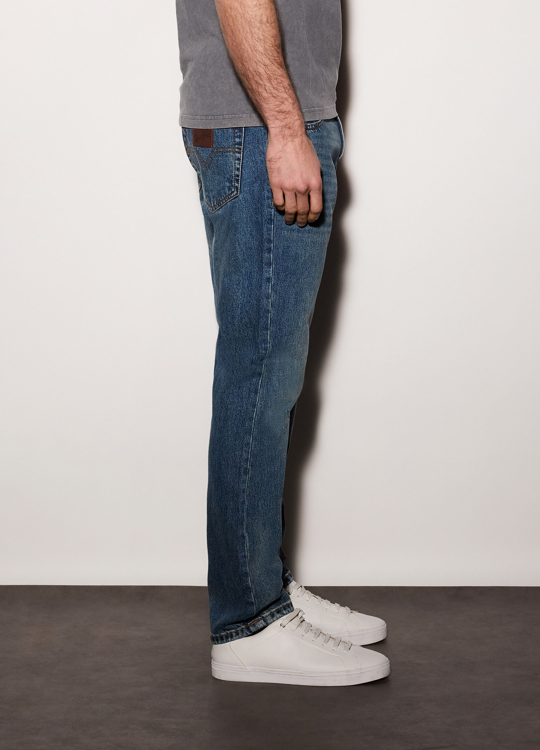Jeans regular fit in denim di cotone uomo_1