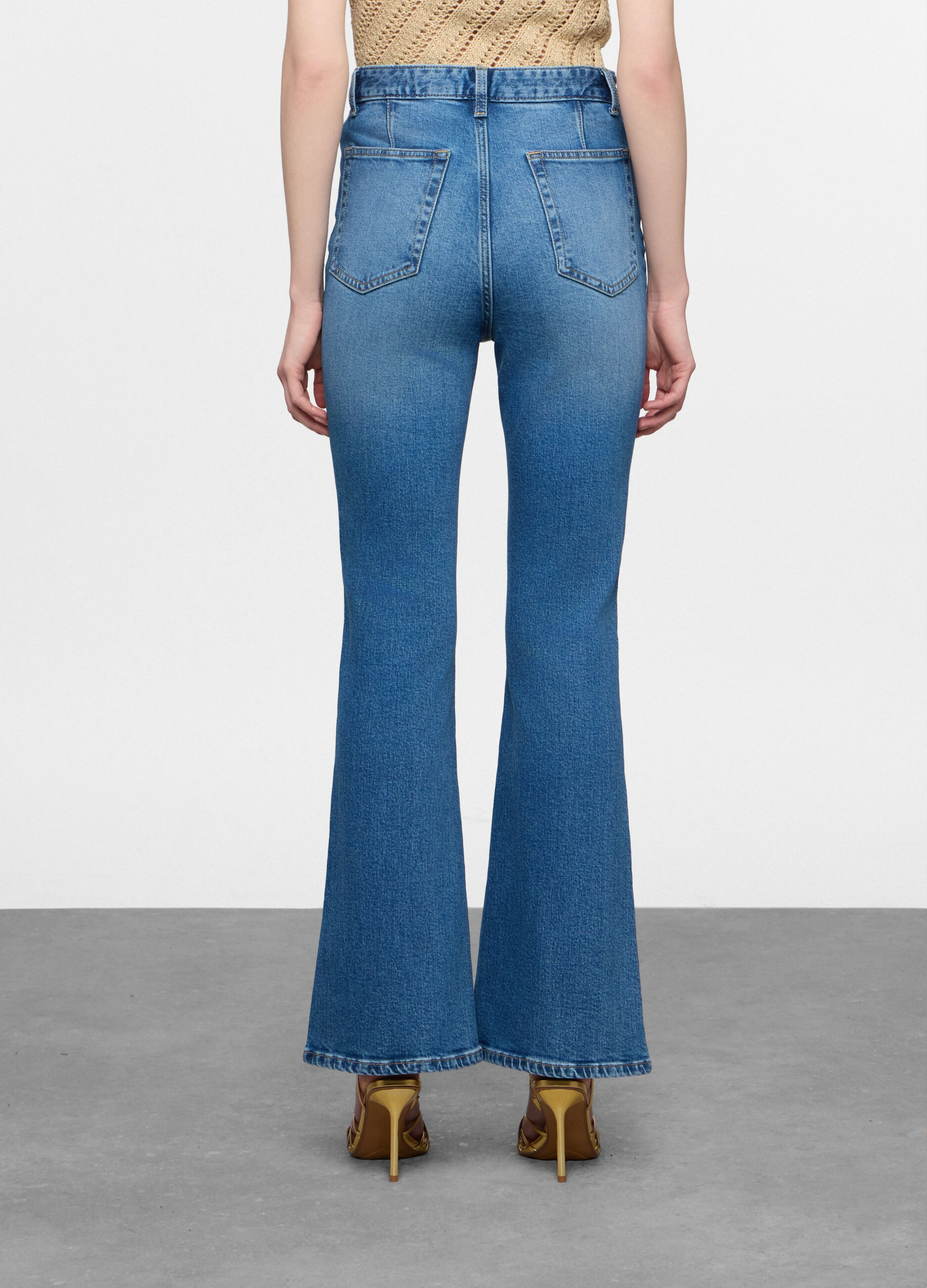 Pantaloni in stretch denim flare fit donna_1