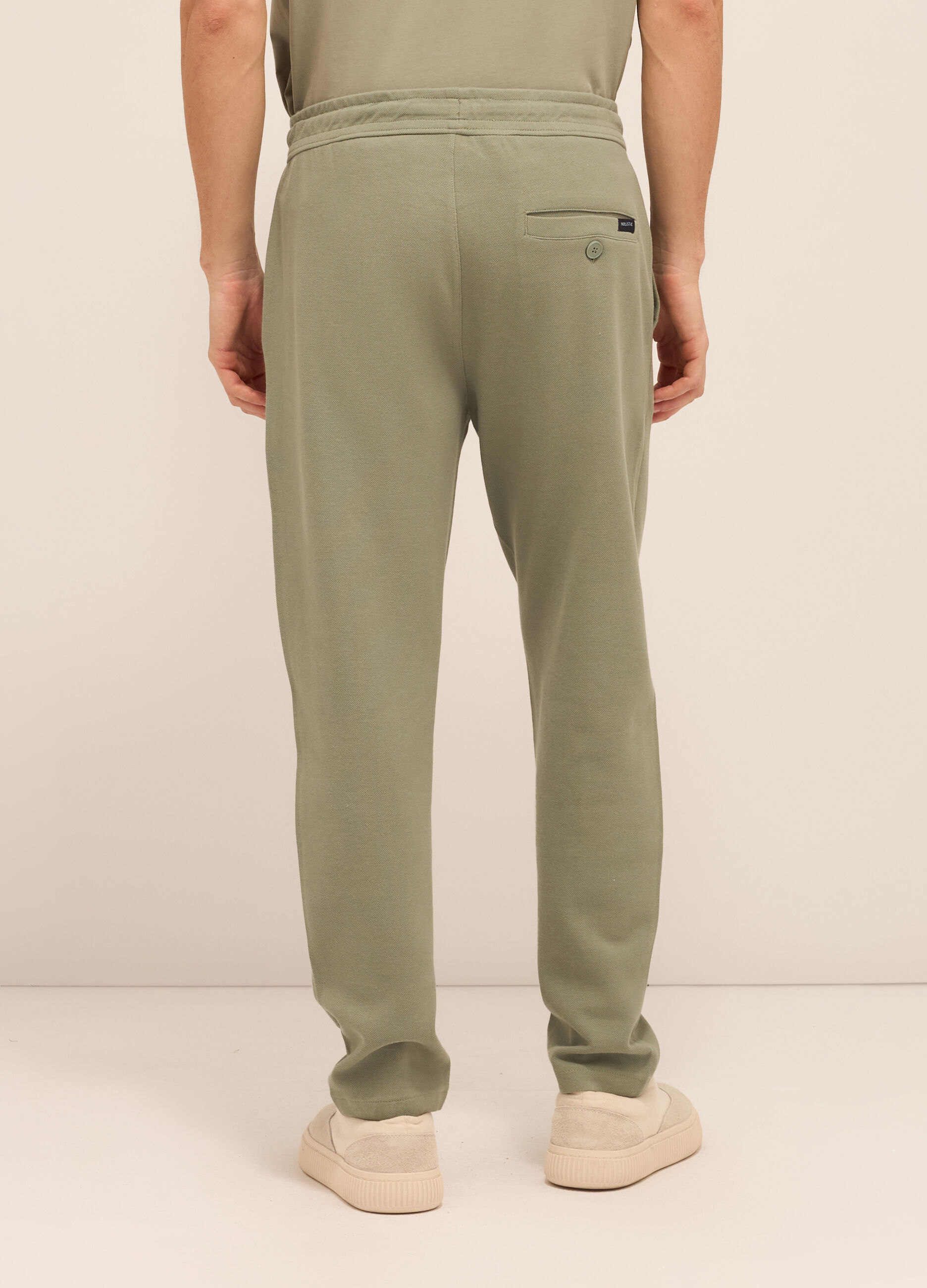 Jogger con piega in puro cotone uomo_1