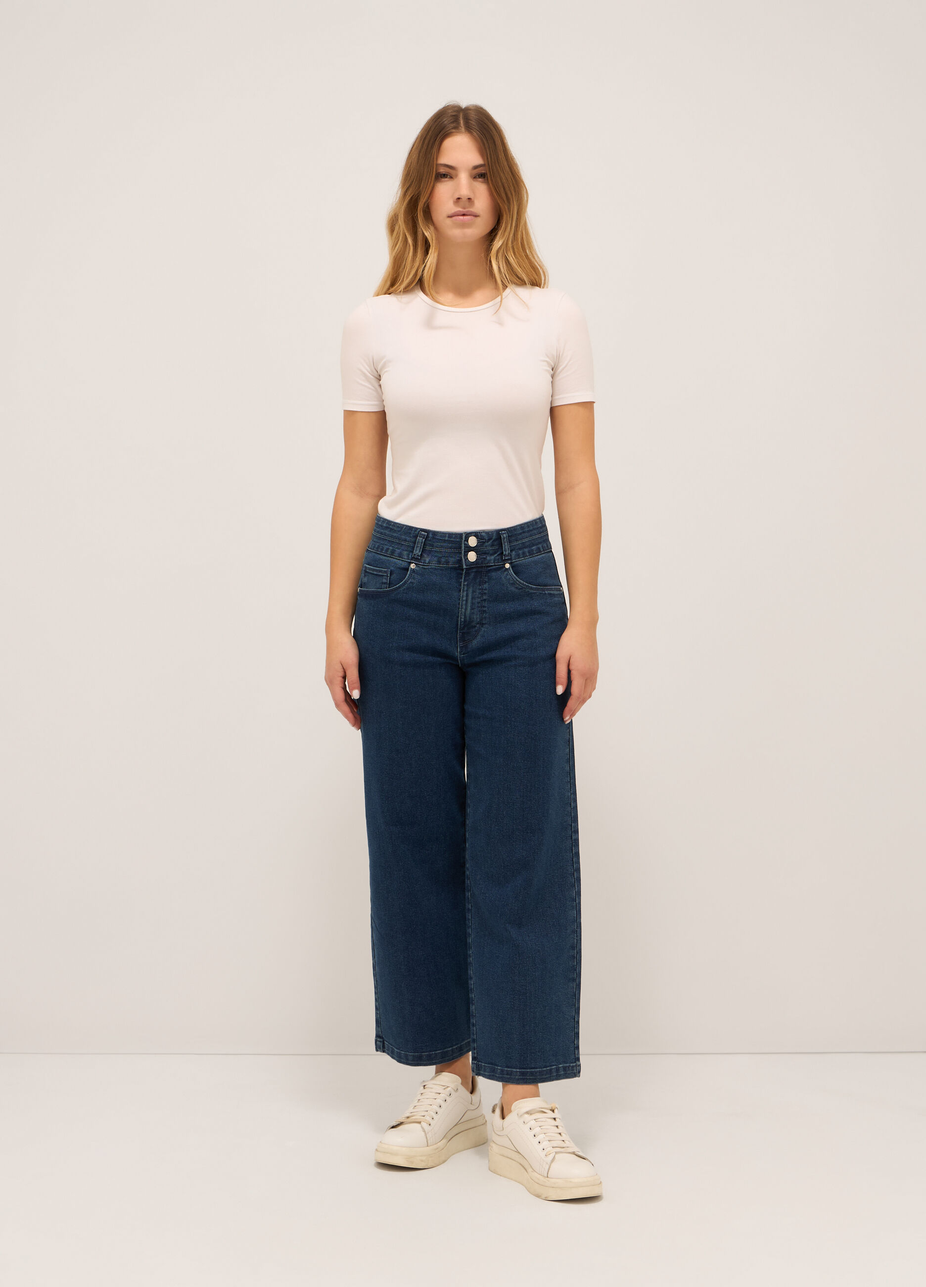 Pantaloni in denim stretch di misto cotone _0