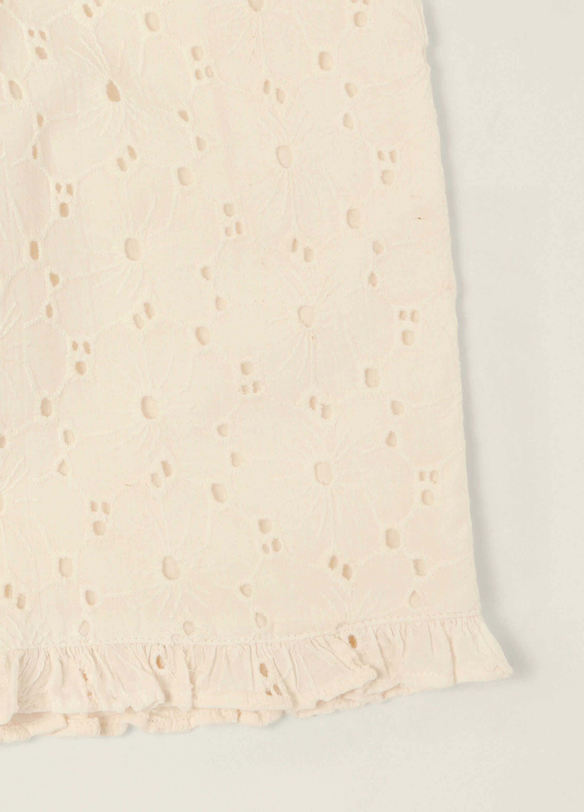 Pantaloni beige in puro cotone con texture traforata_2