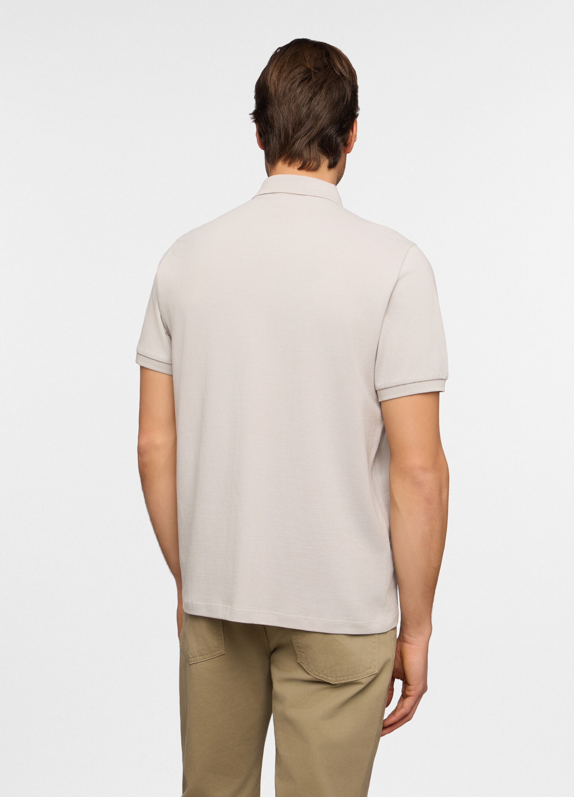 Polo a maniche corte con bottone uomo_1