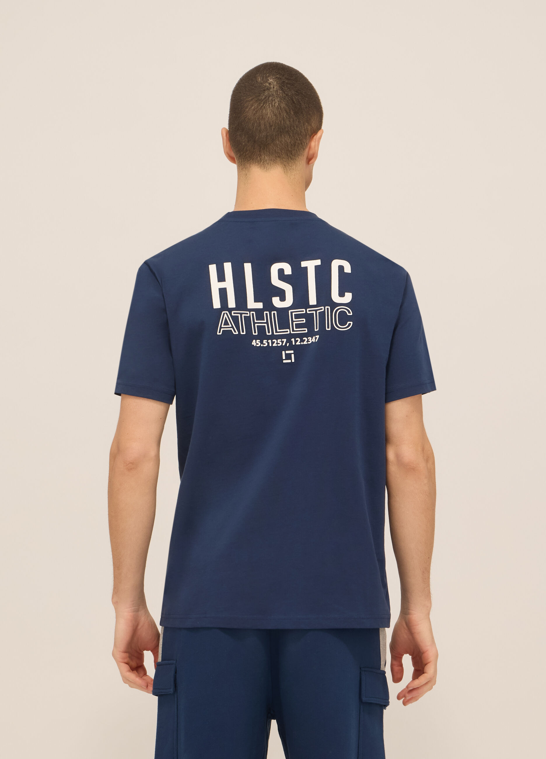 T-shirt sportiva con lettering in cotone uomo_1
