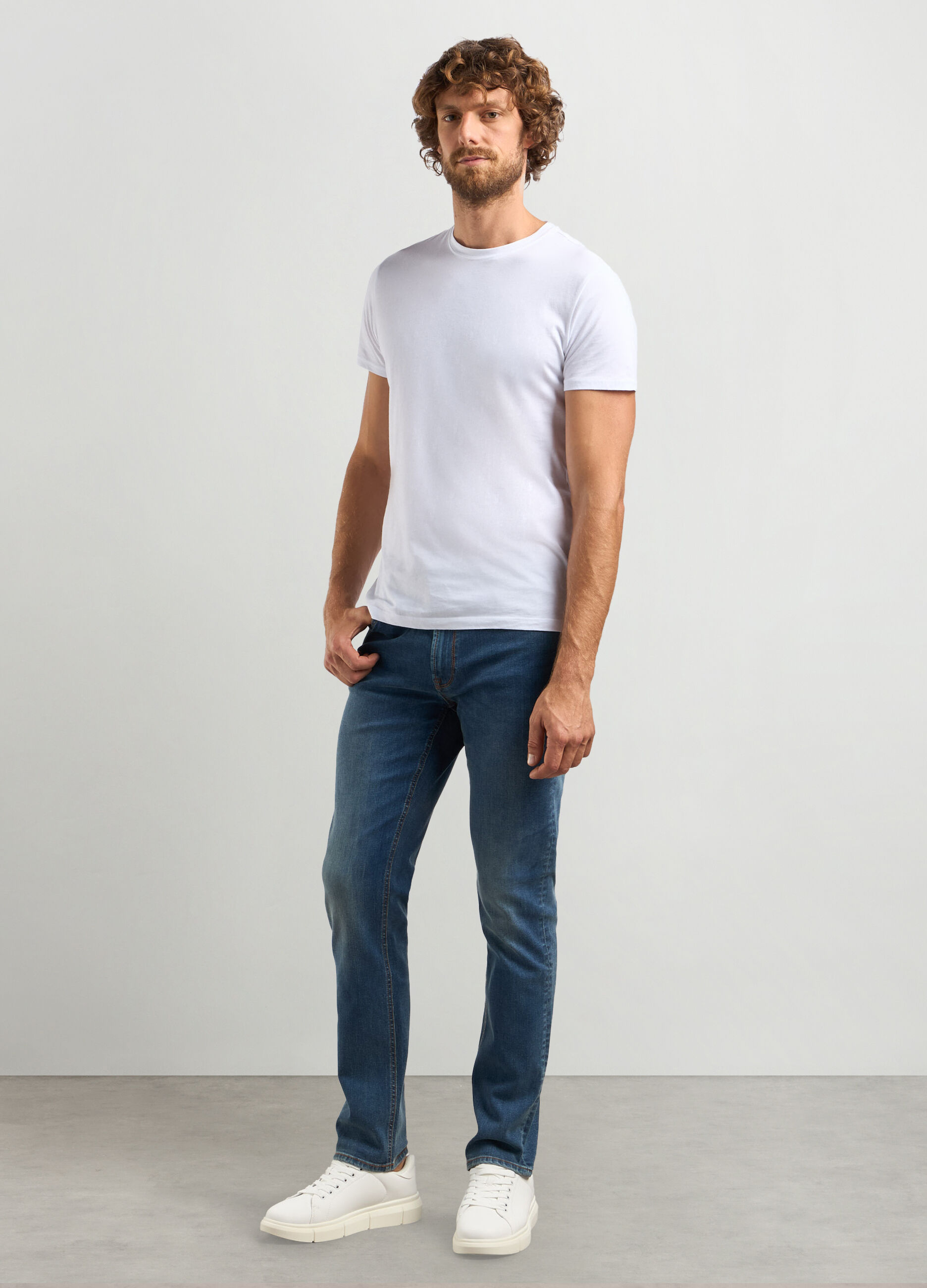 Jeans slim fit in cotone stretch uomo_0