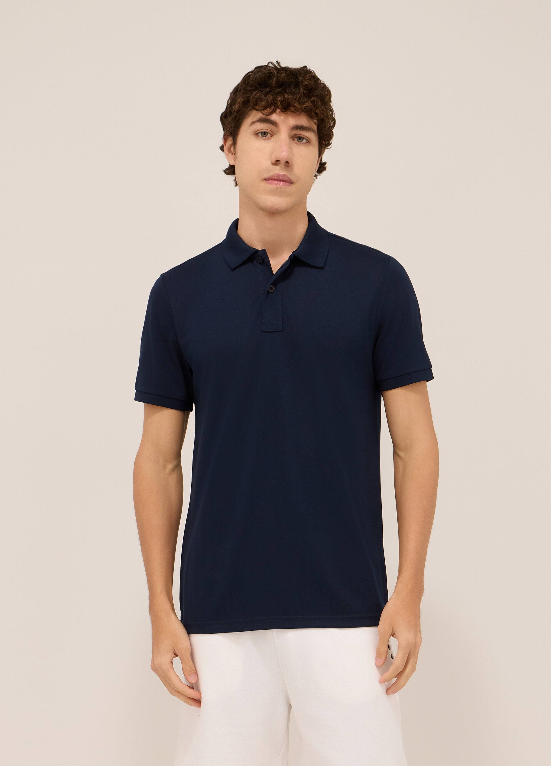 Polo tinta unita in piquet uomo_0