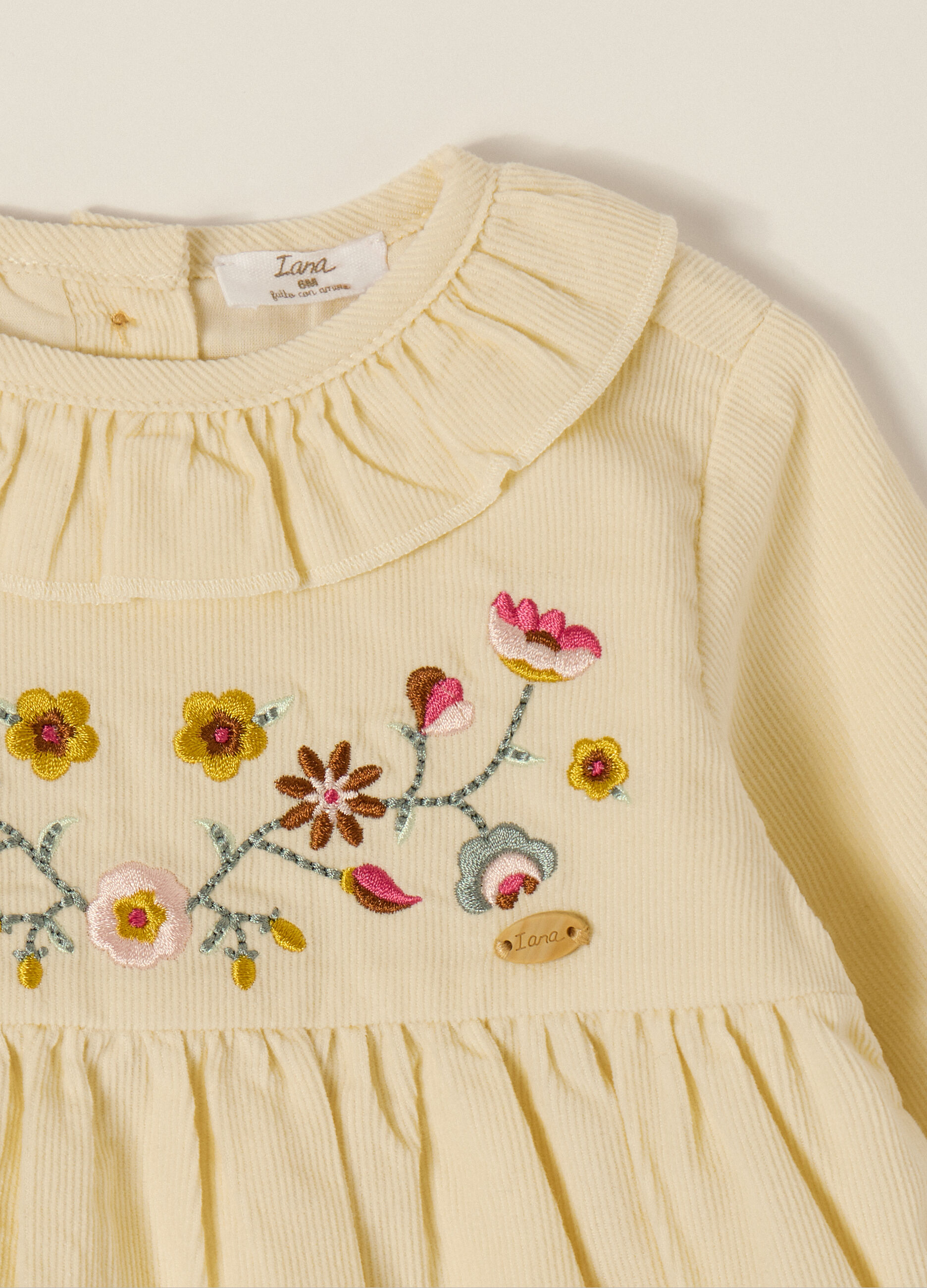 Abito beige in velluto a coste con ricami floreali_2