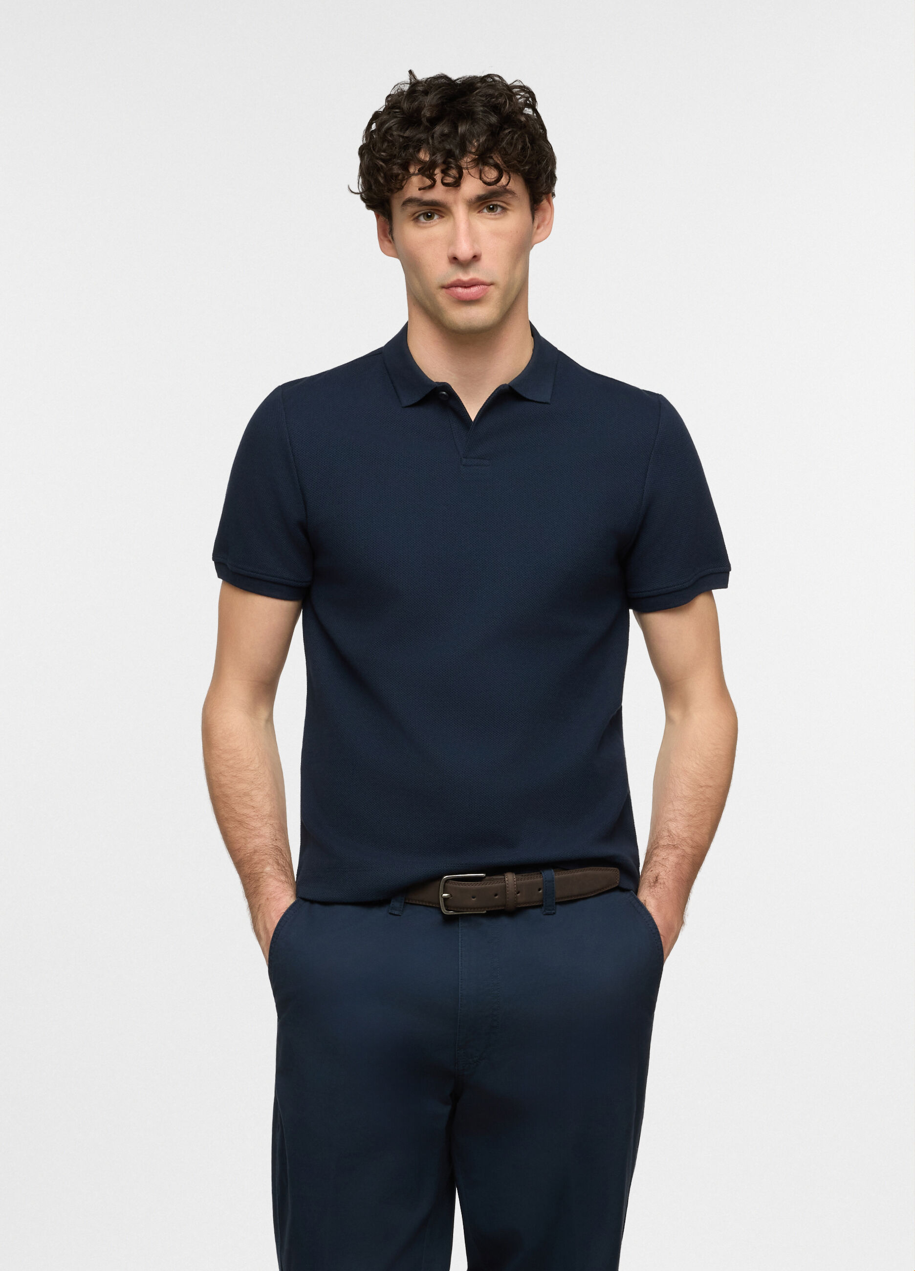 Polo a maniche corte in cotone con allacciatura seminascosta uomo_0